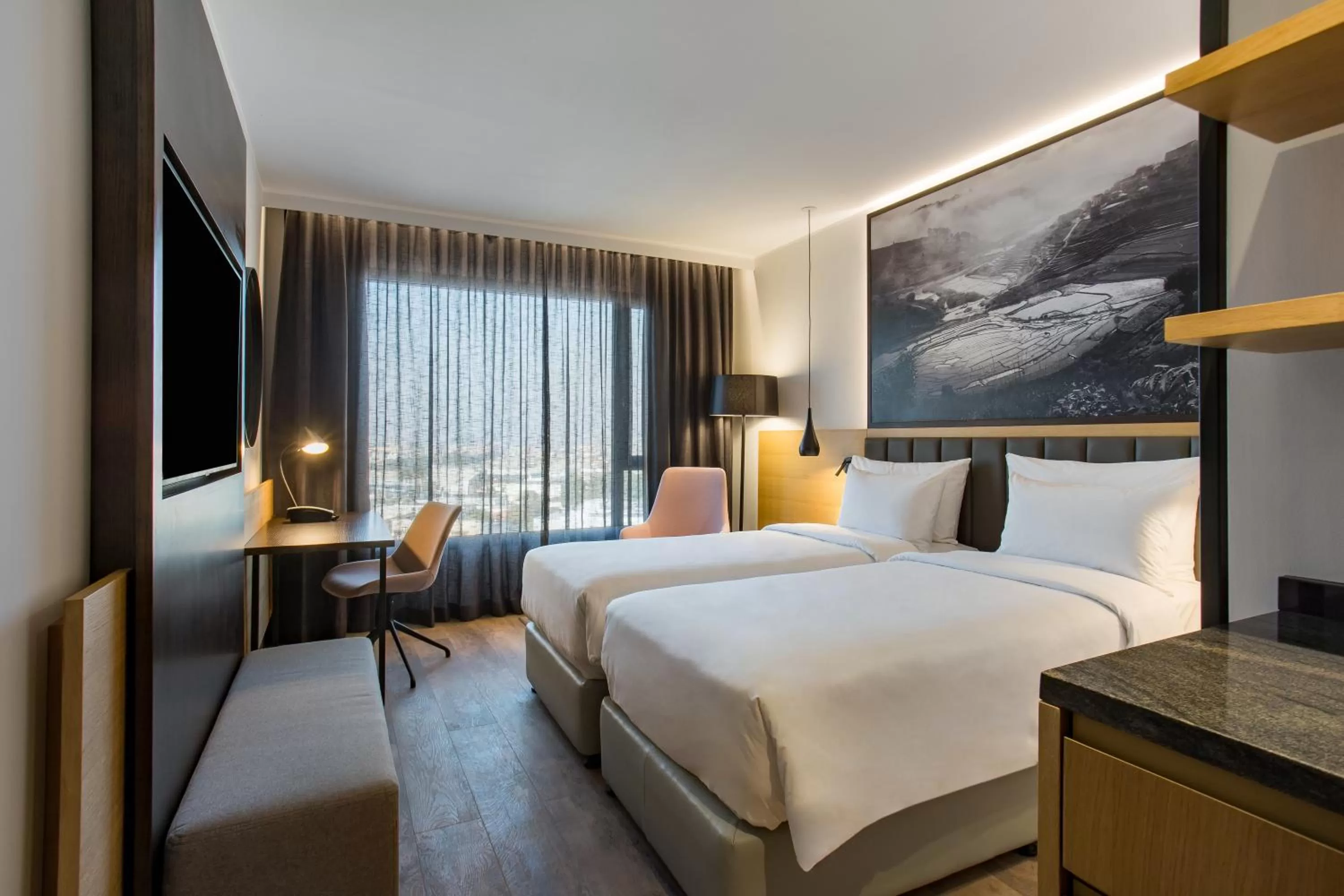 Photo of the whole room, Bed in Radisson Blu Hotel Antananarivo Waterfront