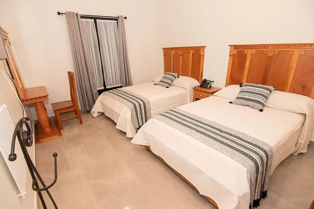 Deluxe Queen Room with Two Queen Beds in Hotel Danini Deluxe Queen Room with Two Queen Beds in Hotel Danini