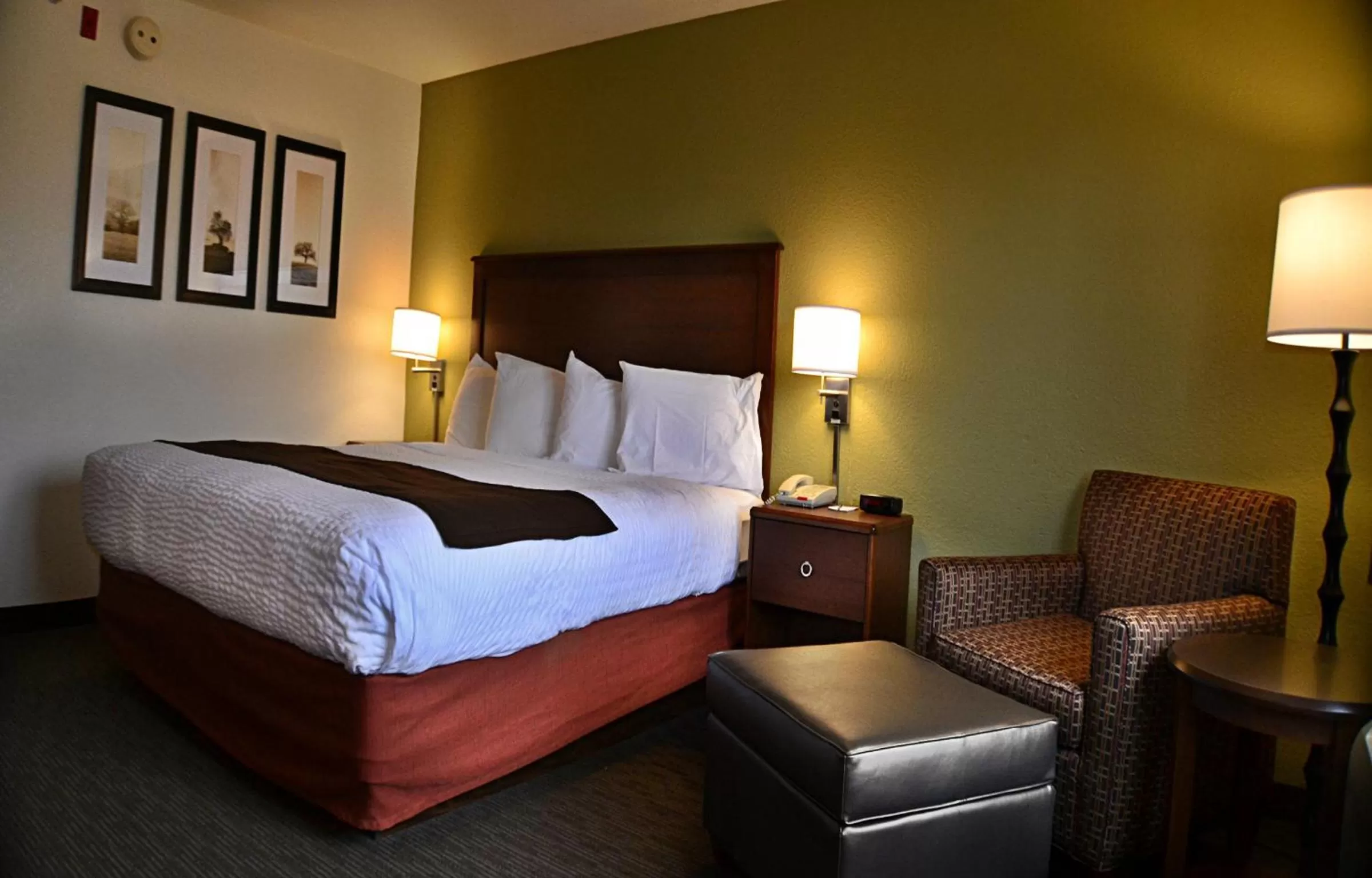 Bed in AmericInn by Wyndham Calumet
