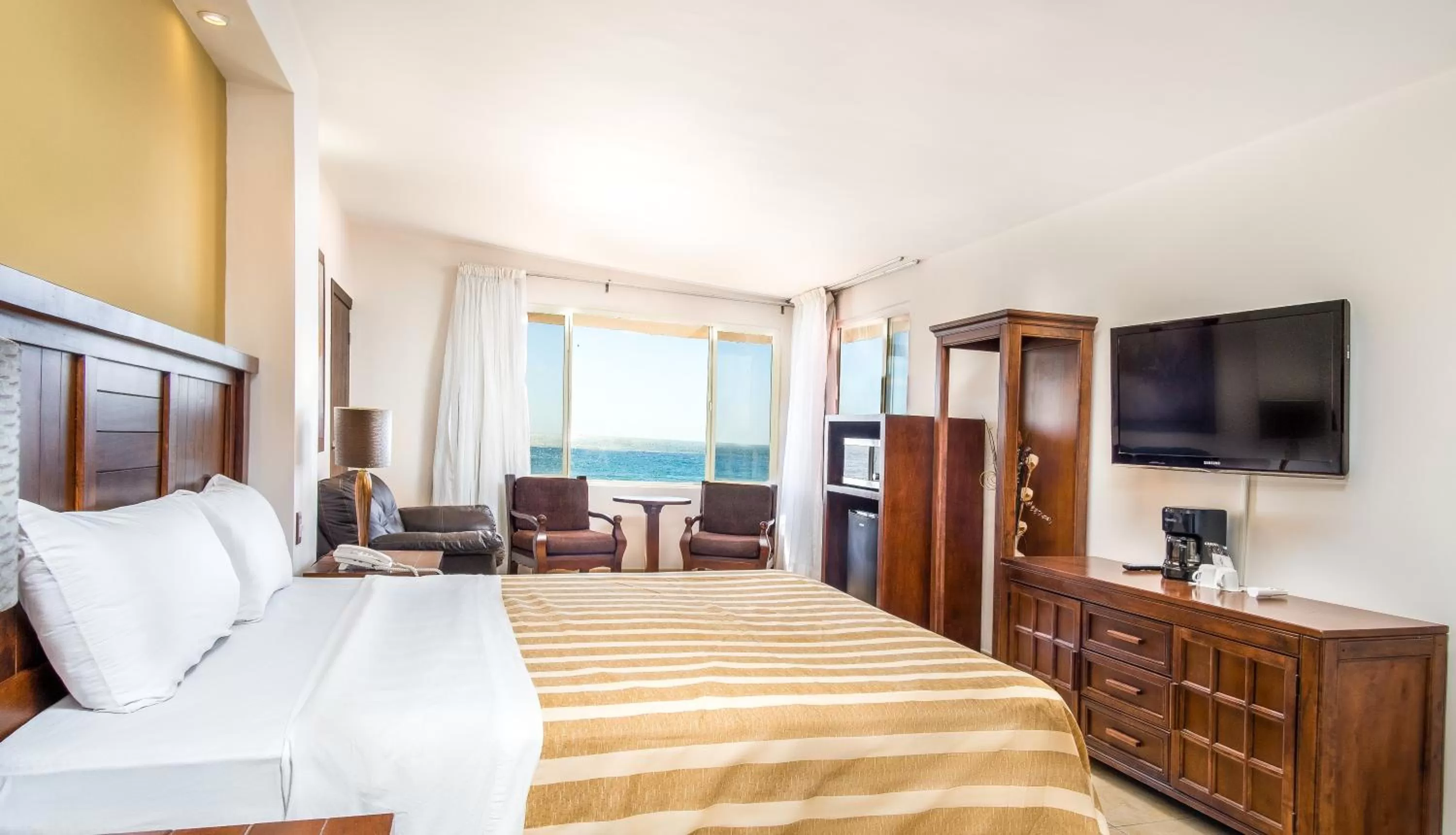 Photo of the whole room, Bed in Puerto Nuevo Baja Hotel & Villas