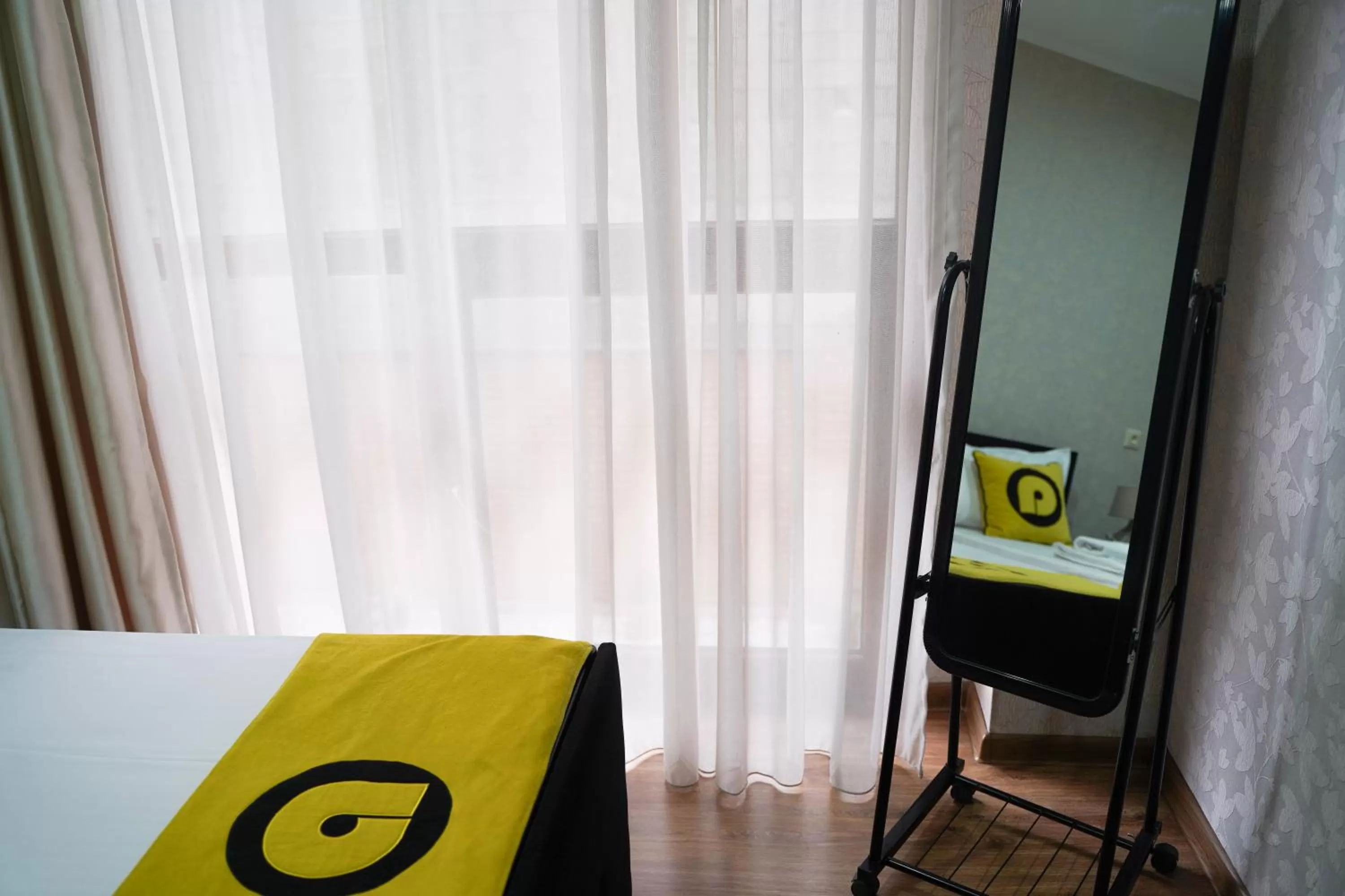 Bedroom in Aura Plaza Hotel