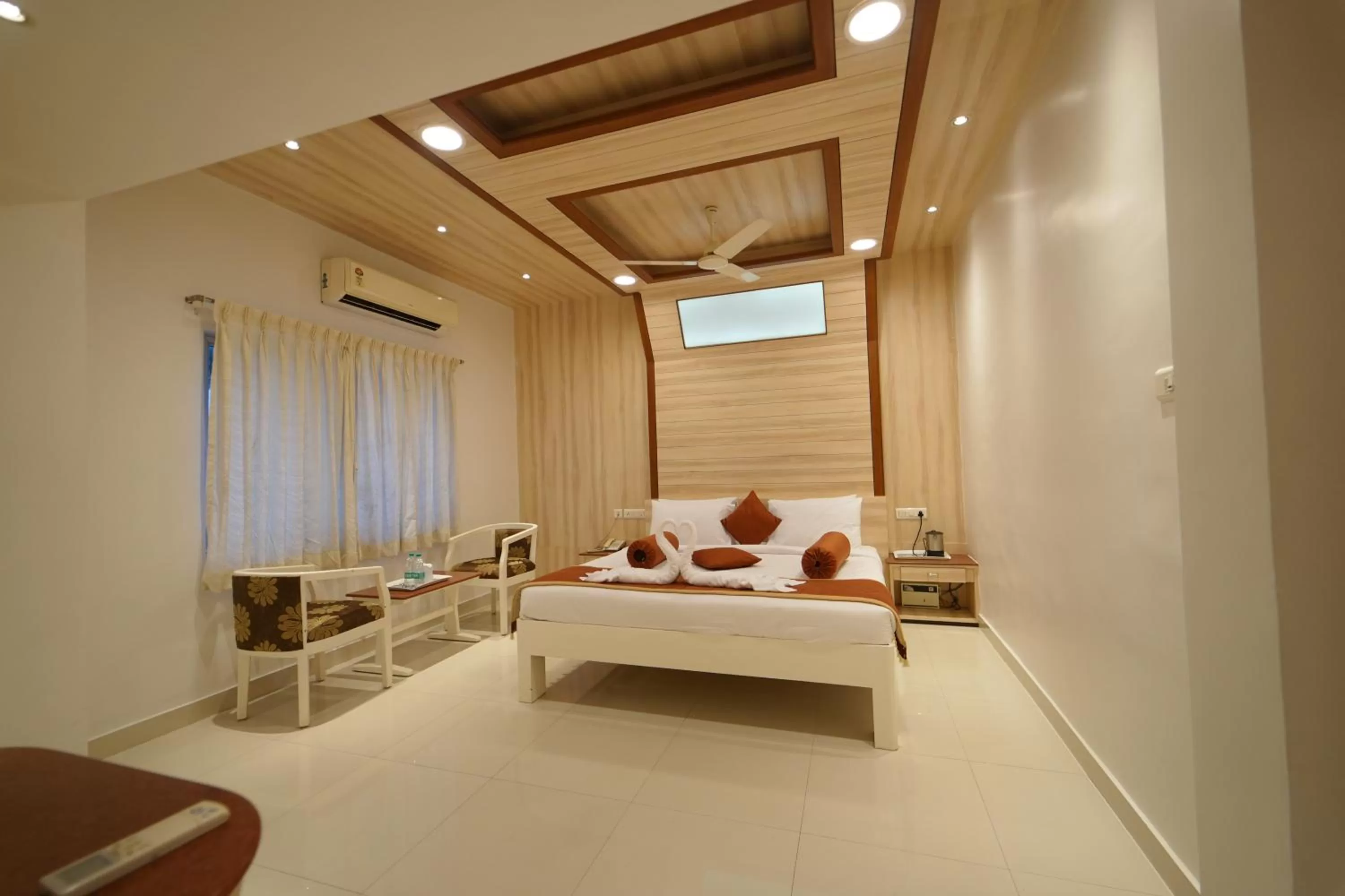 Photo of the whole room, Bed in Hotel Palmyra Grand Inn