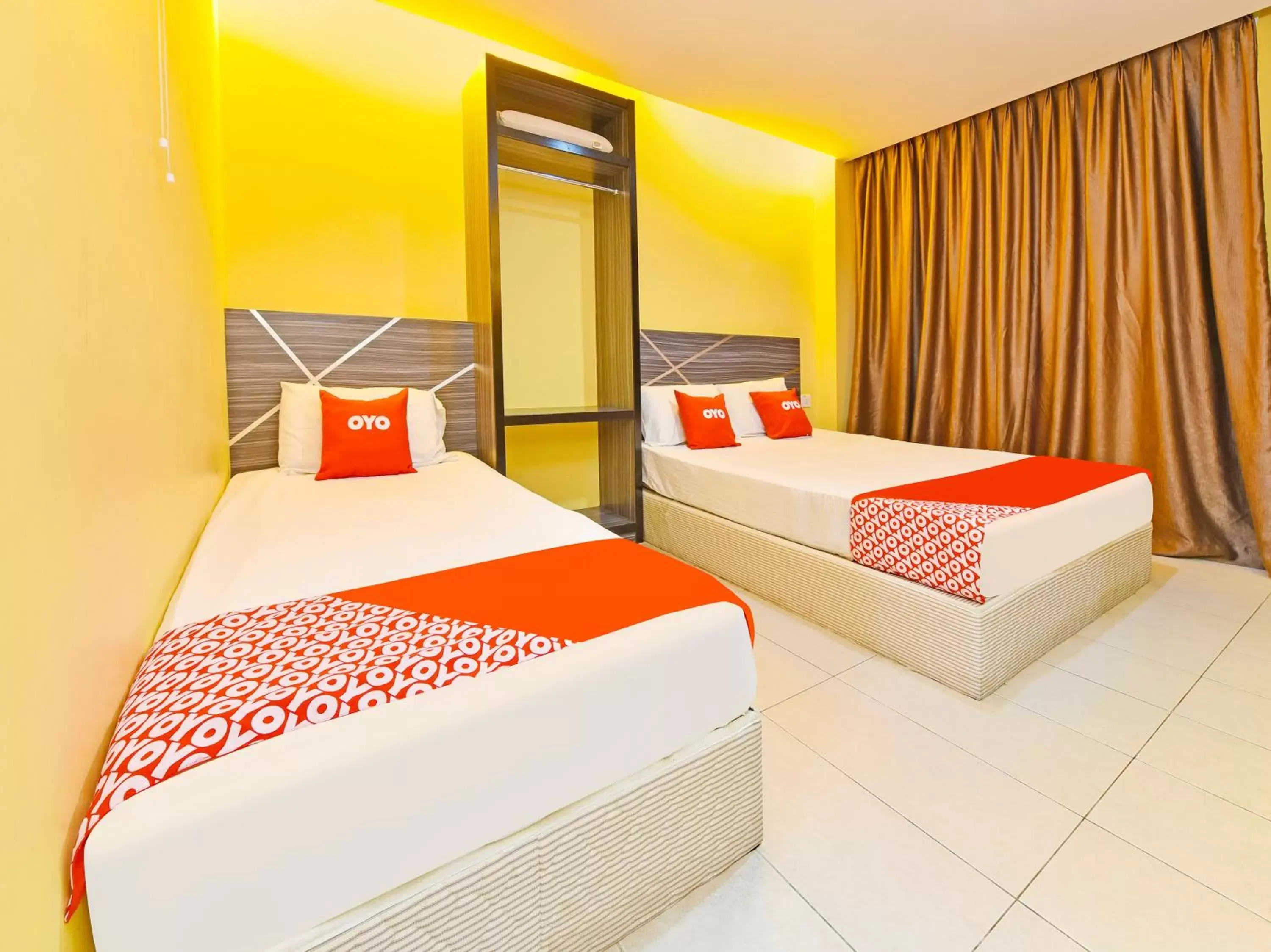 Deluxe Triple Room in OYO 90521 De Mawardah Inn Deluxe Triple Room in OYO 90521 De Mawardah Inn