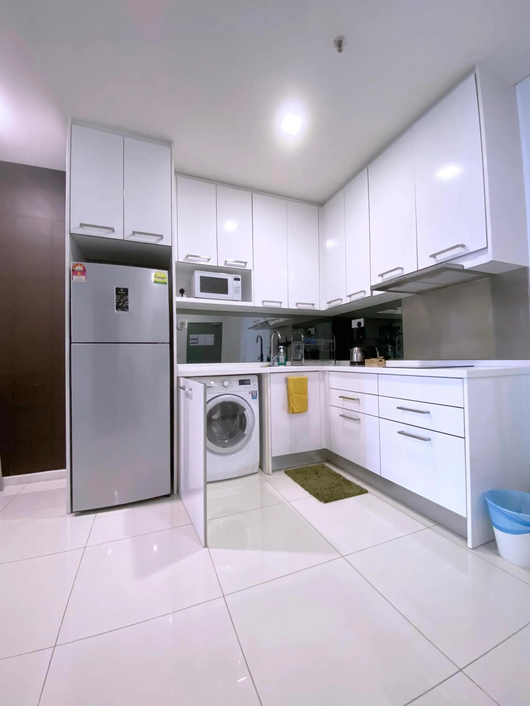 Kitchen/Kitchenette in Mercu Summer Suite KLCC @ Penguin Homes