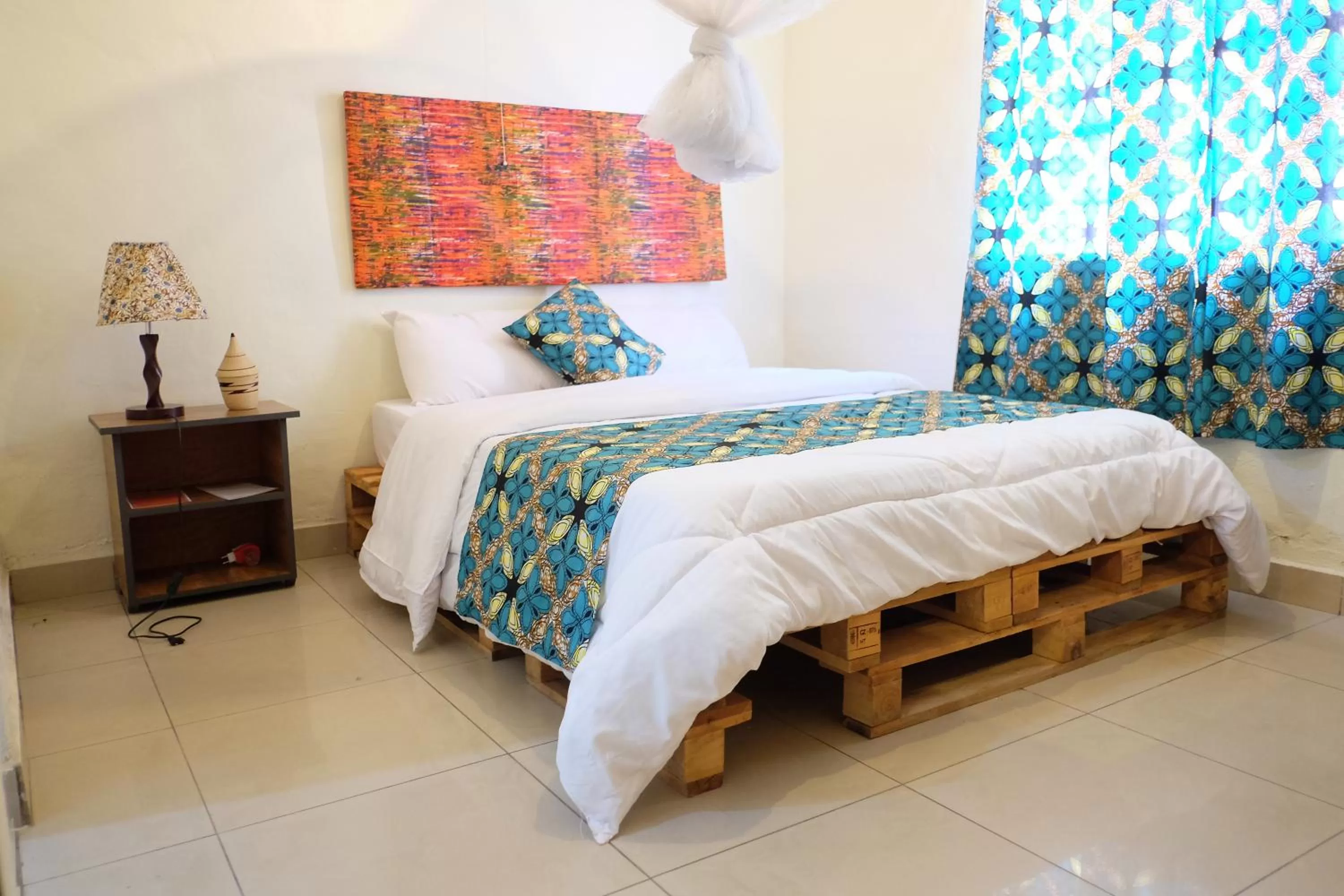 Bed in INZOZI AFRICA HOUSE B&B- Kacyiru