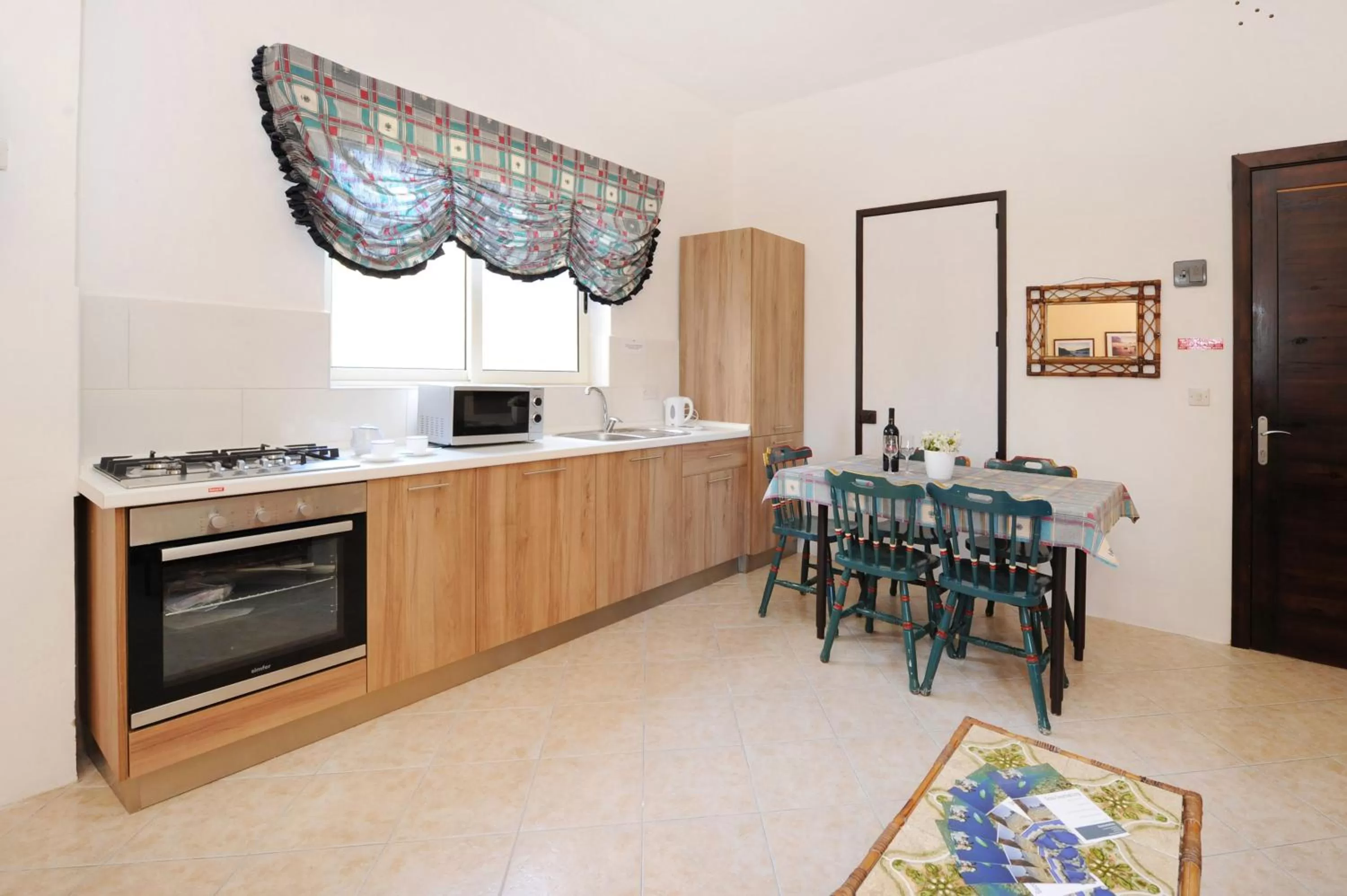 Kitchen or kitchenette in Mariblu Hotel