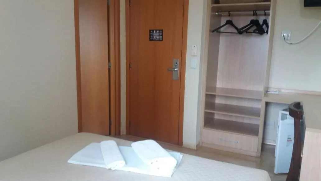 Bed in Onix Inn Hotel