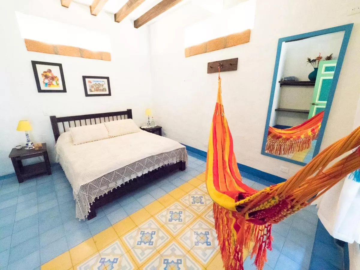 Bed in El Despertar Hotel