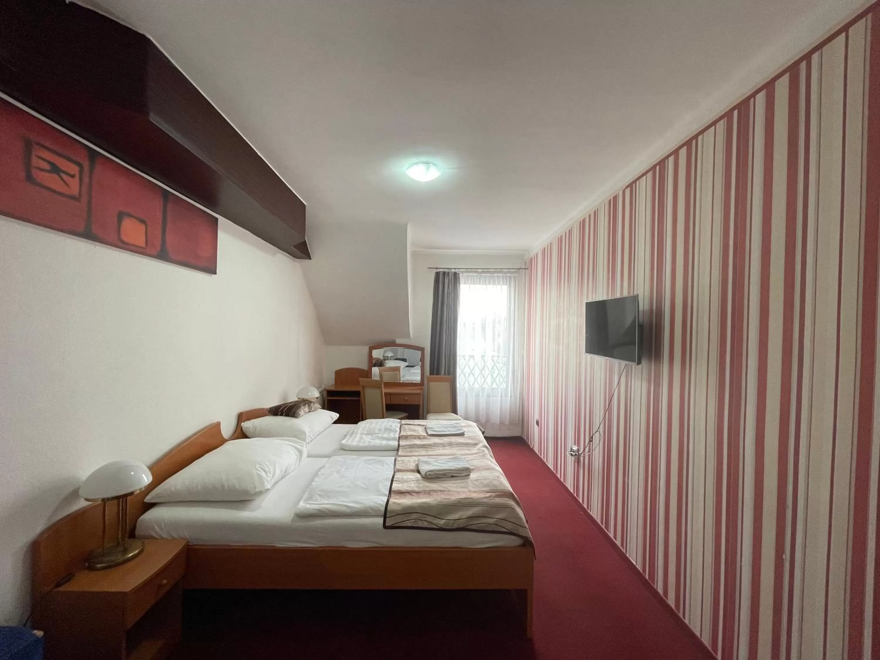 Bed in Hotel Minaret&Étterem