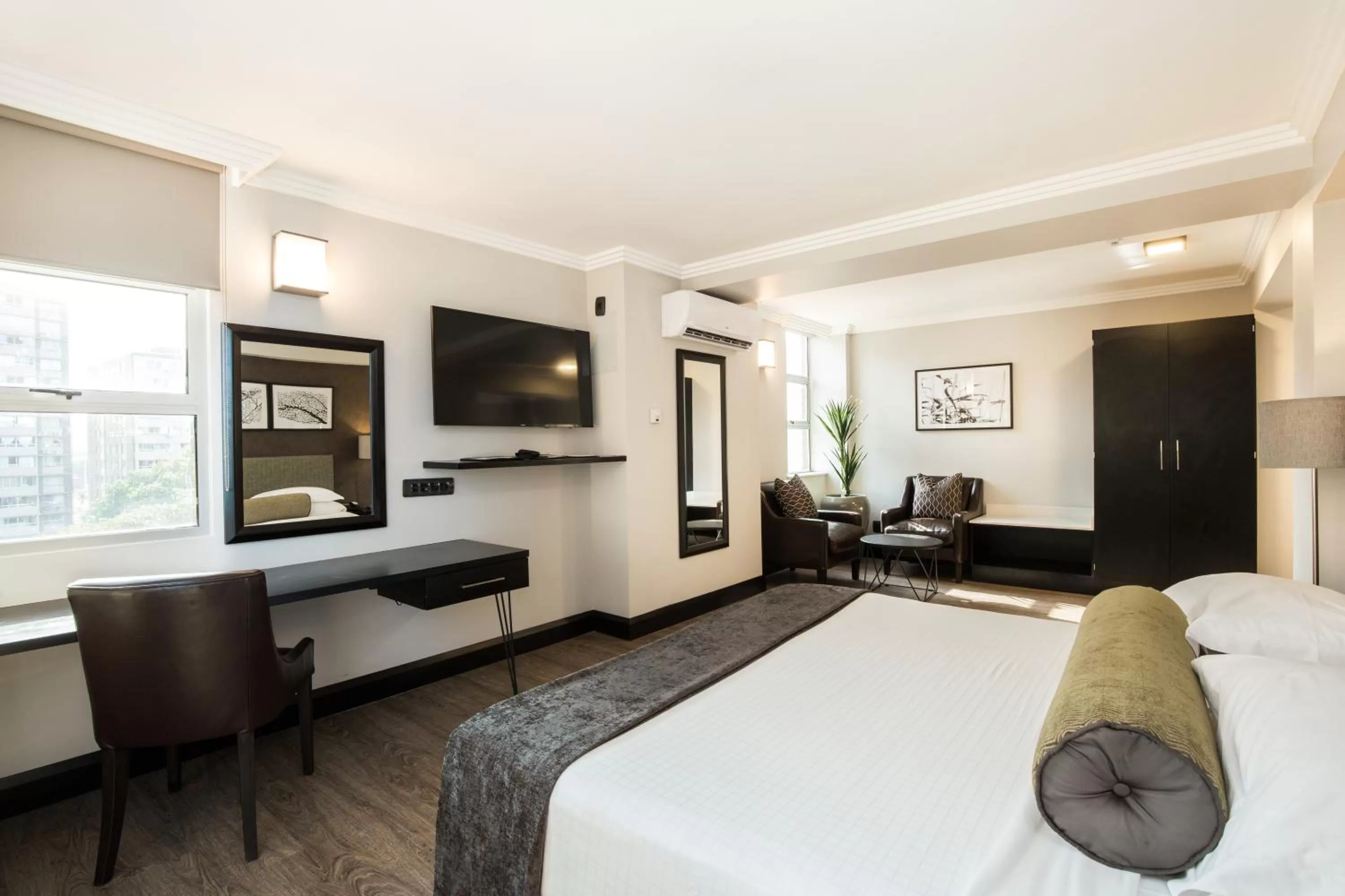 Bedroom, Bed in Belaire Suites Hotel