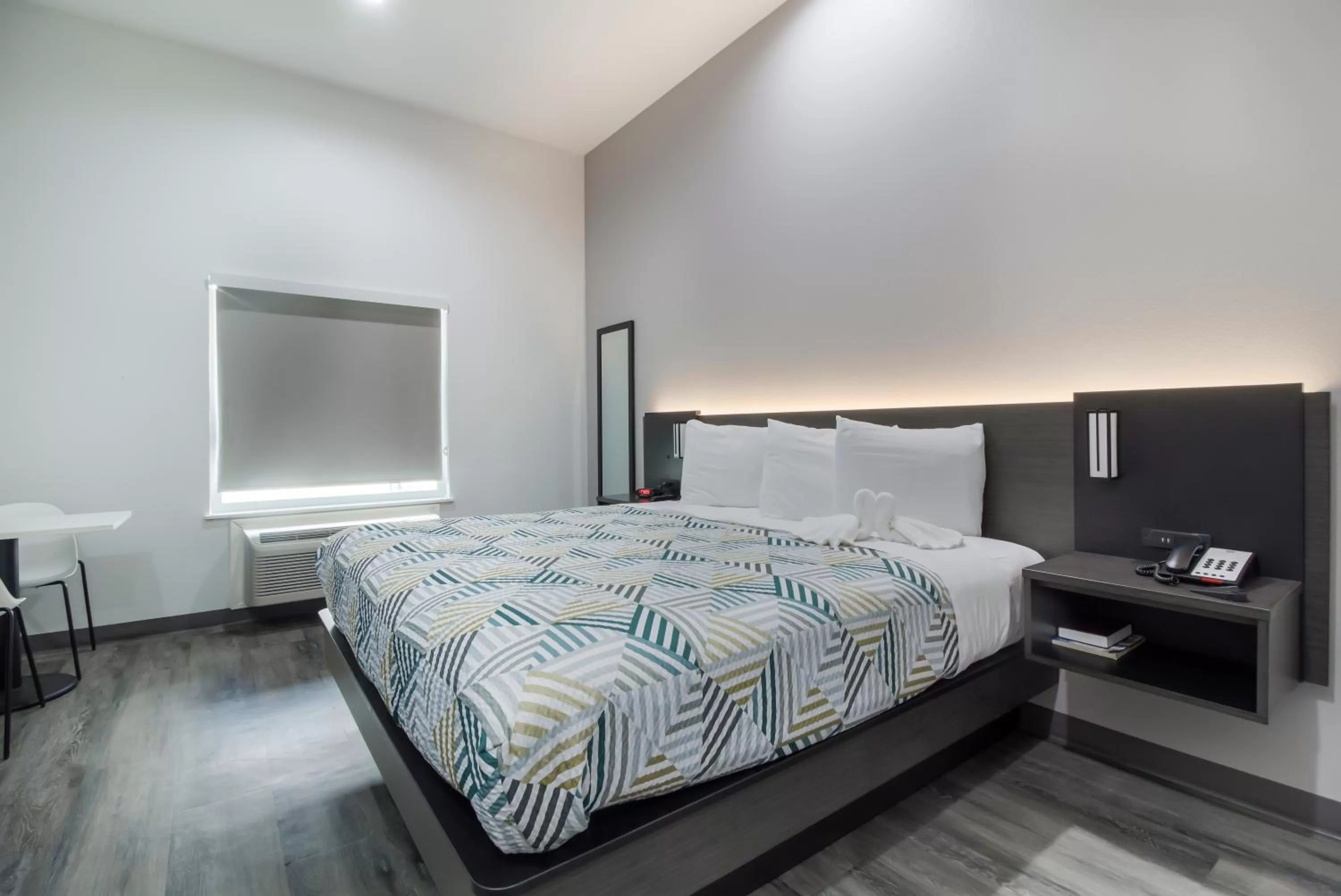 Bed in Studio 6 Katy, Tx