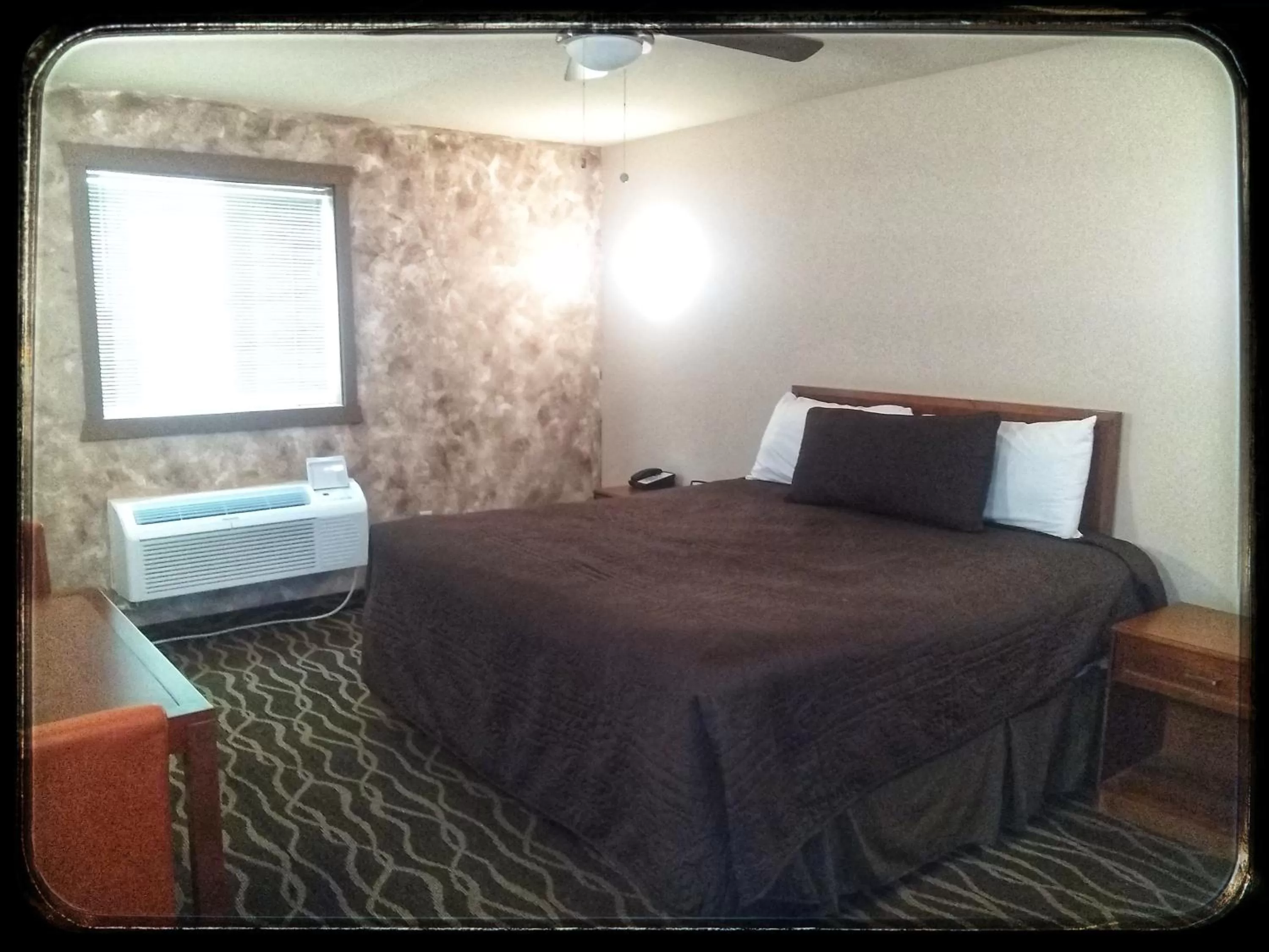 Bed in The Sunset Inn