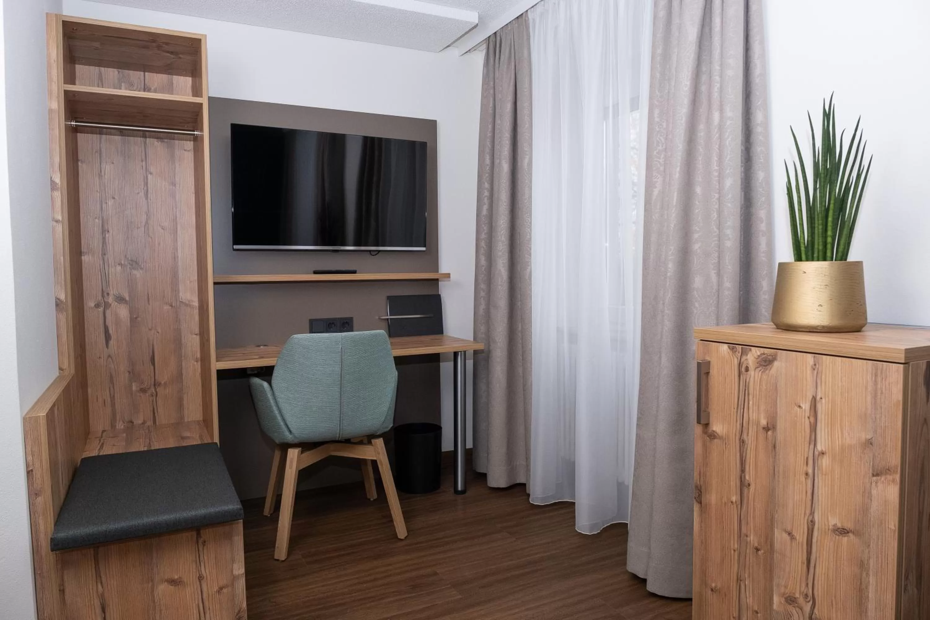 TV/Entertainment Center in Gasthaus Hotel Kranz