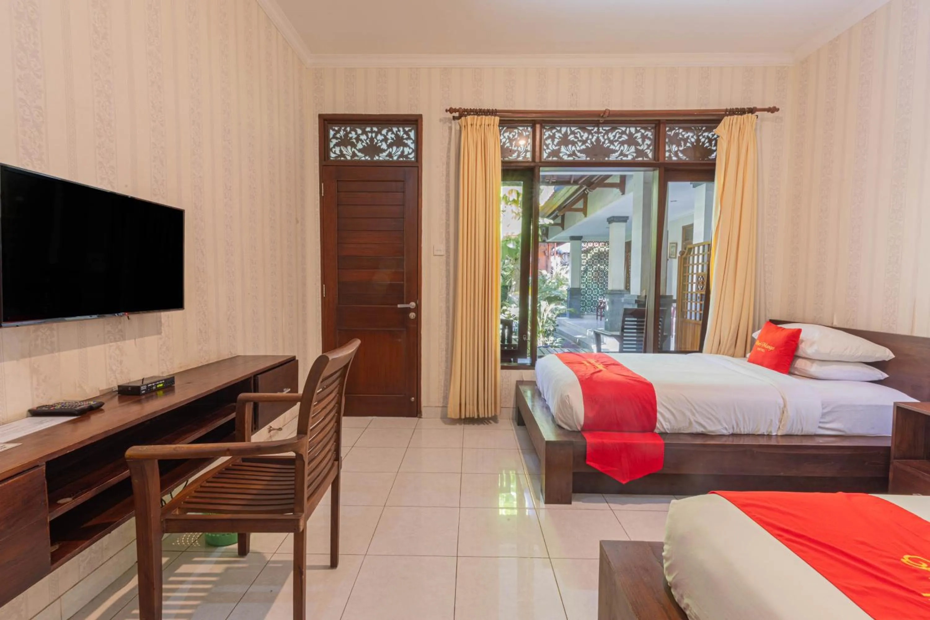 Bedroom in Puri Mango Guest House Sanur