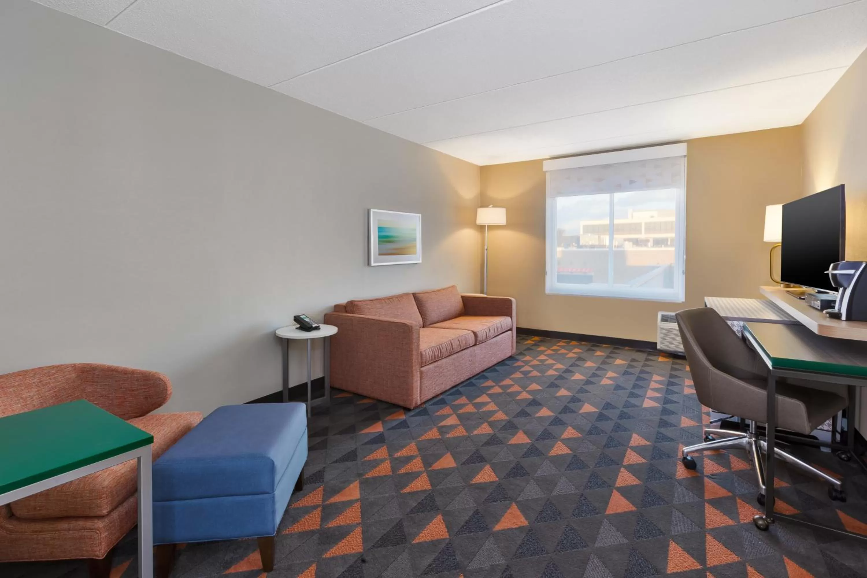 Living room in Holiday Inn Westbury-Long Island by IHG