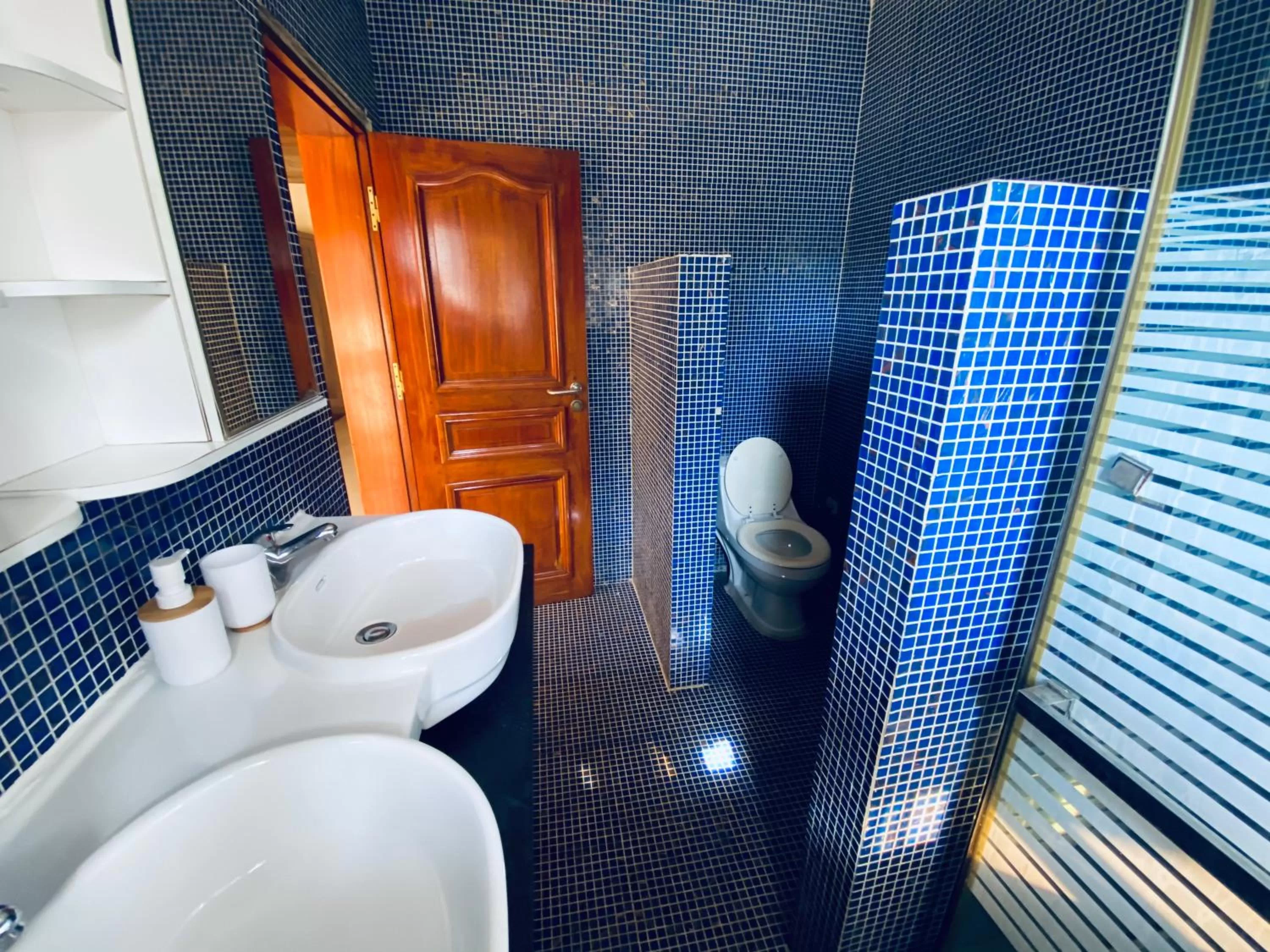 Bathroom in L'Oasis Guesthouse