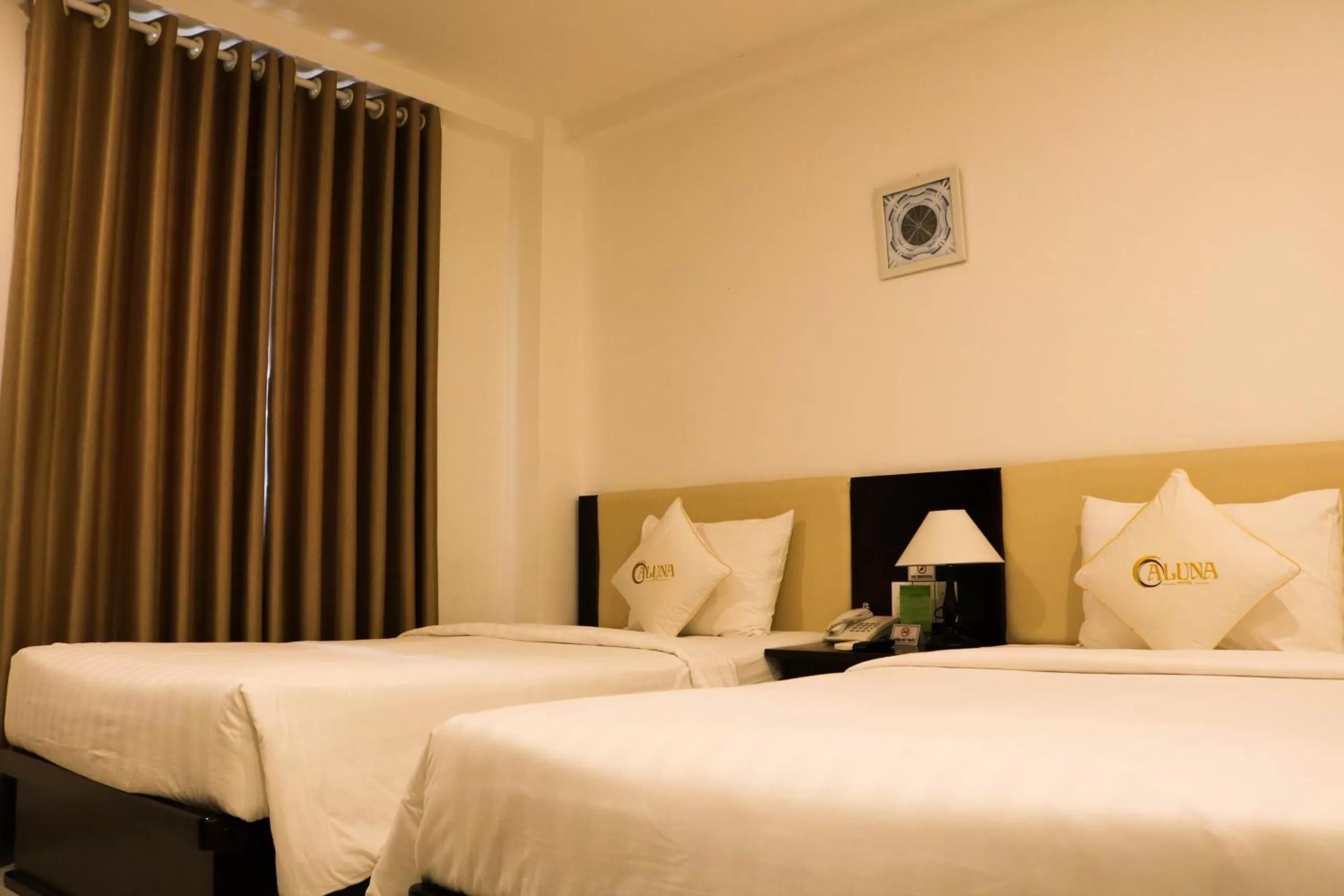 Bed in ALUNA Ben Thanh Hotel