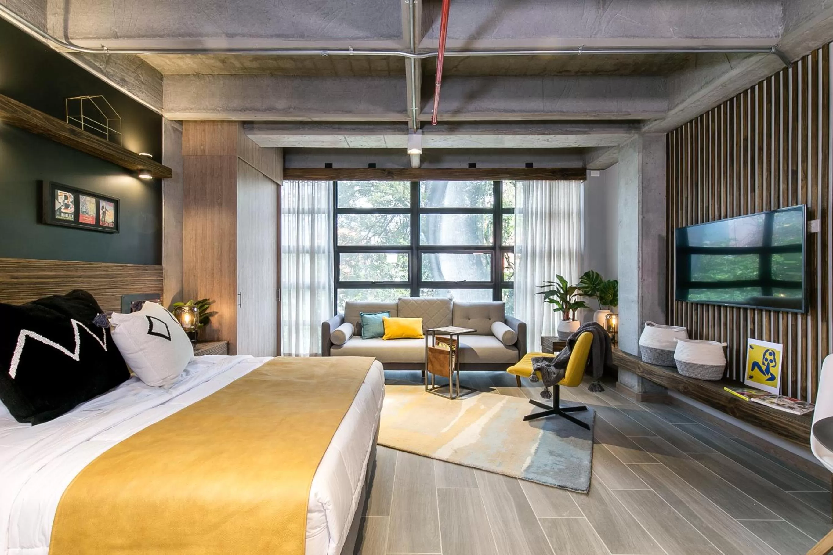 Bed in Factory Lofts Hotel