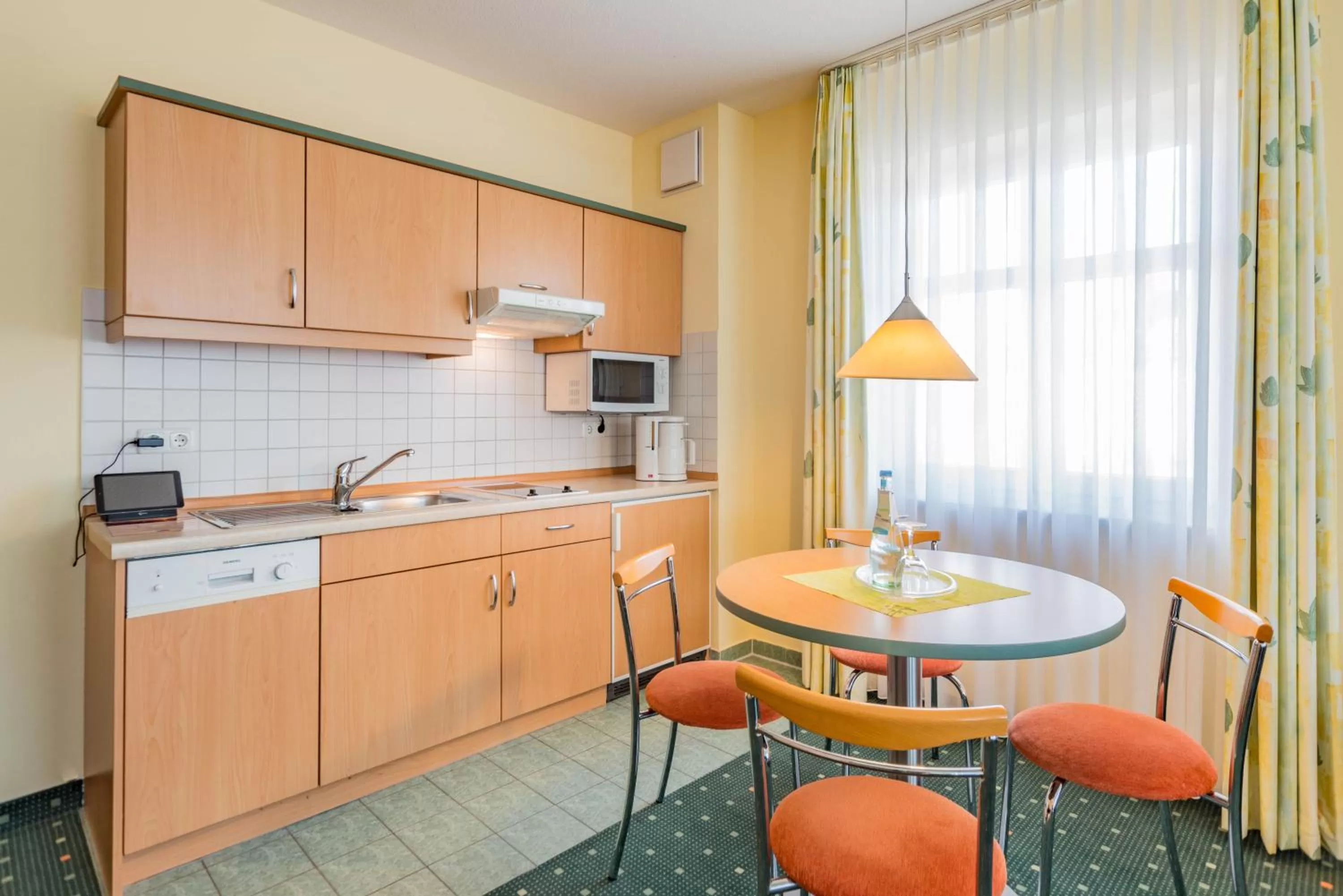 Kitchen or kitchenette in Am Weststrand Aparthotel Kühlungsborn