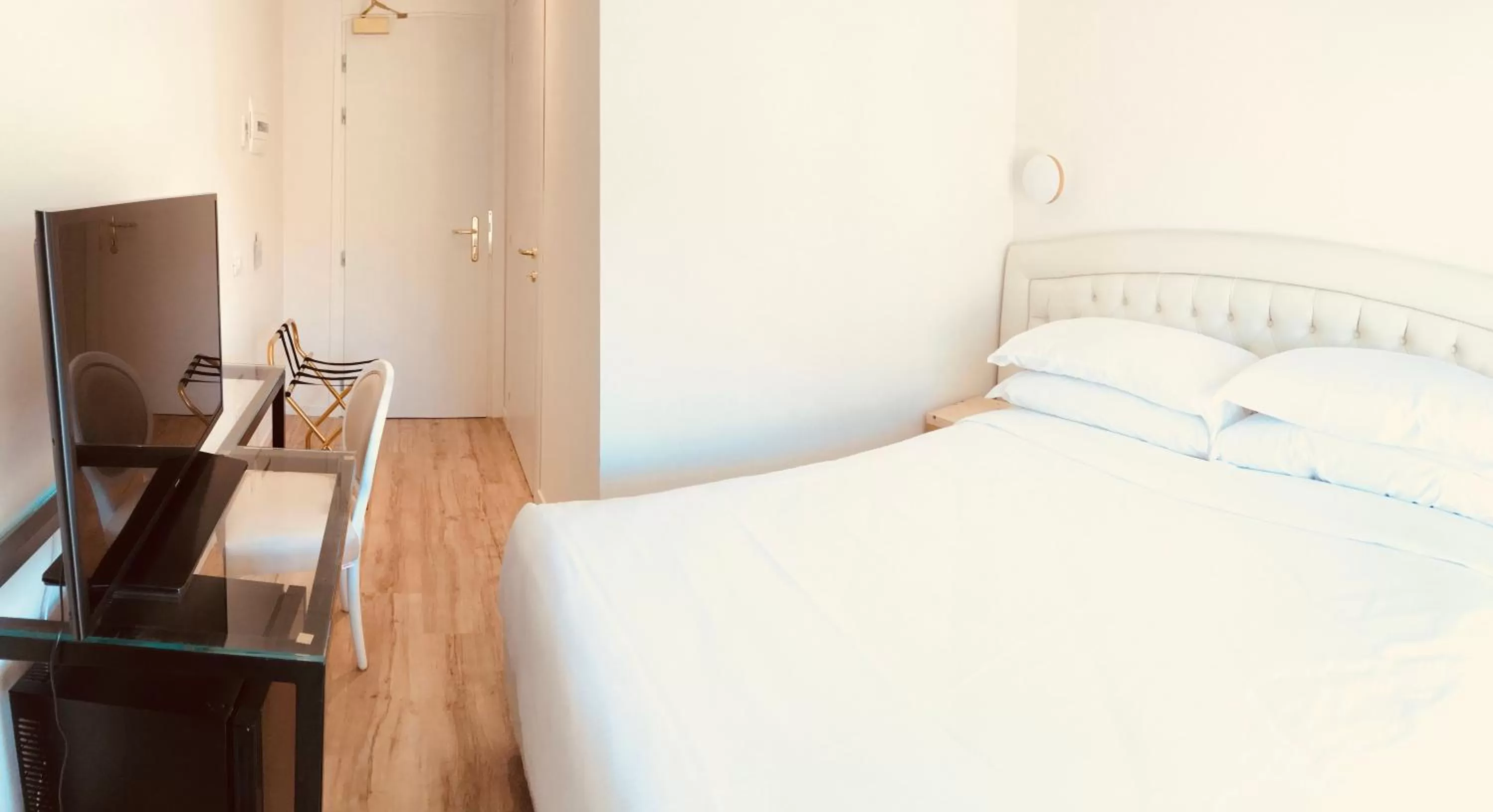 Bed in Palazzo Otello 1847 Wellness & Spa