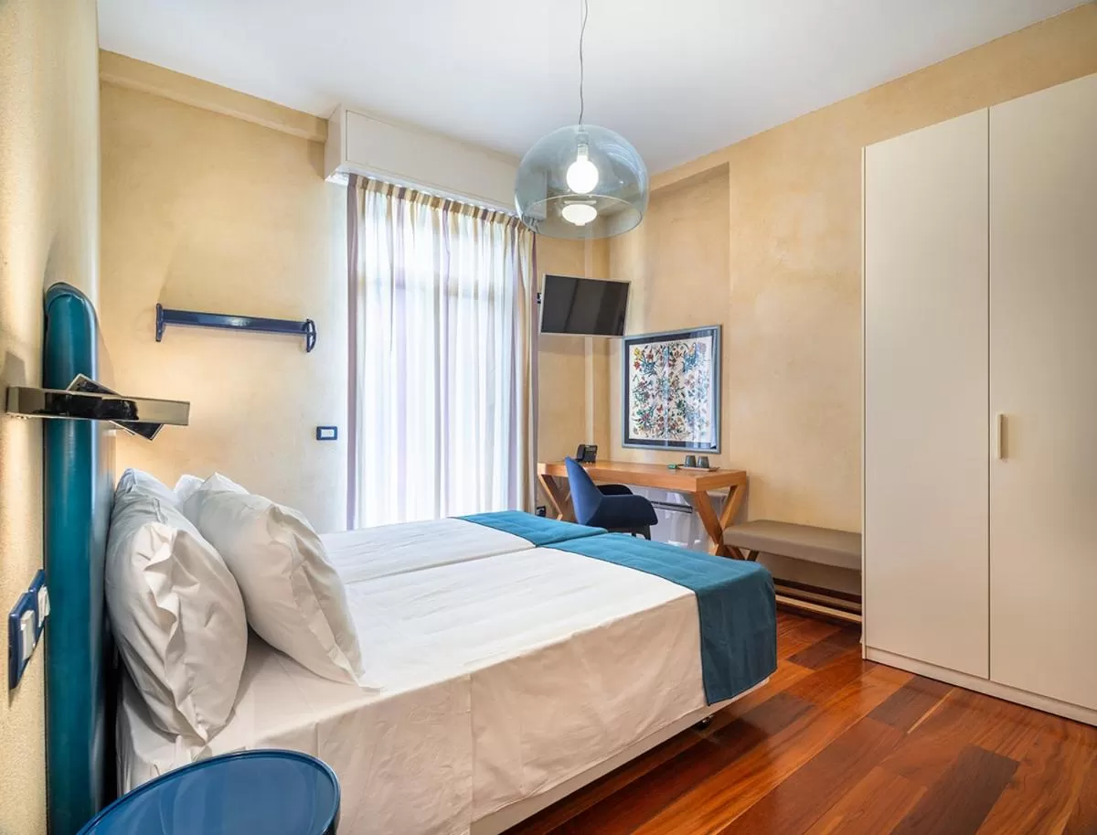 Bed in Rosabianca Boutique Hotel