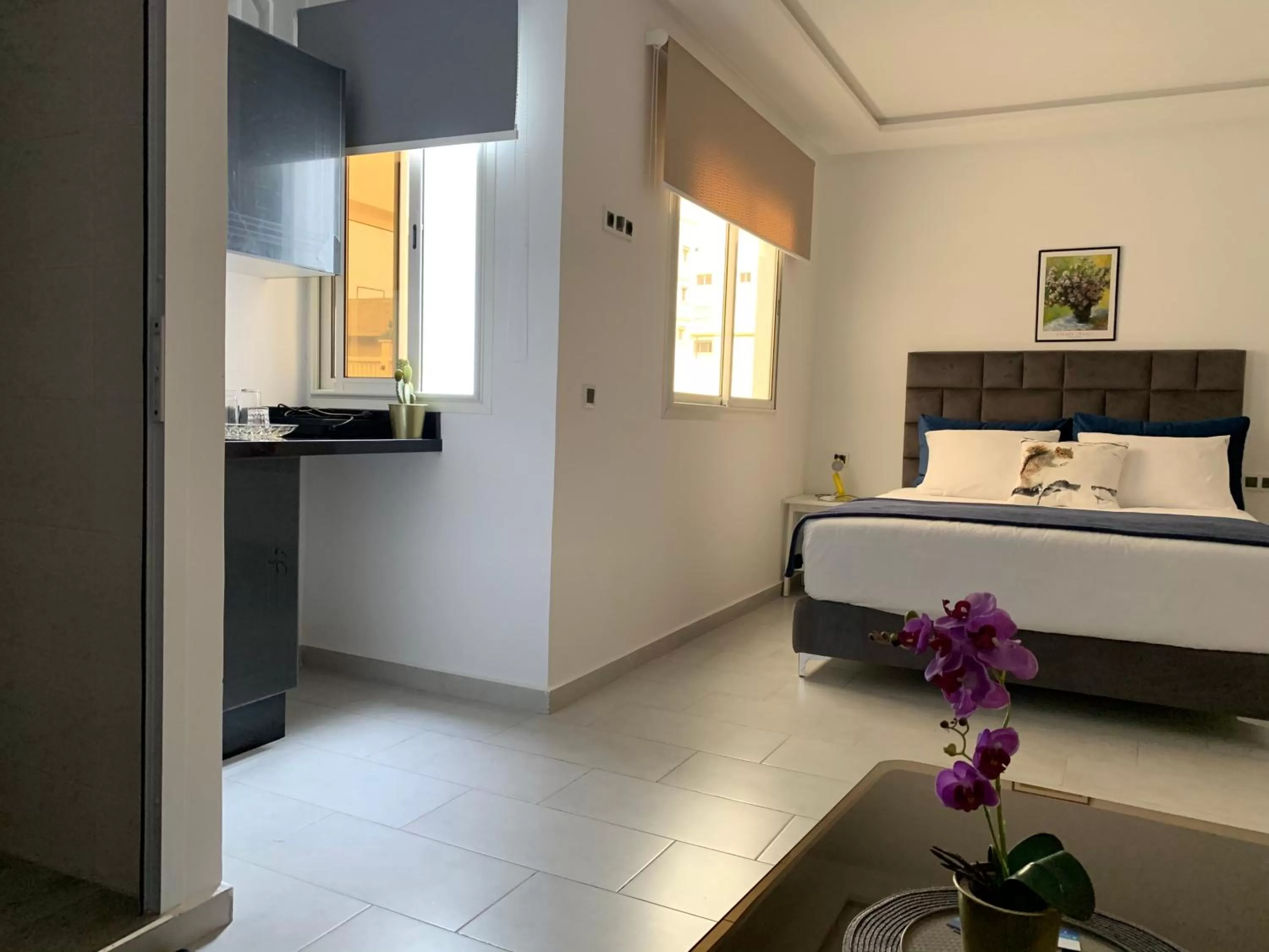 Bed in Appart Hotel Monaco