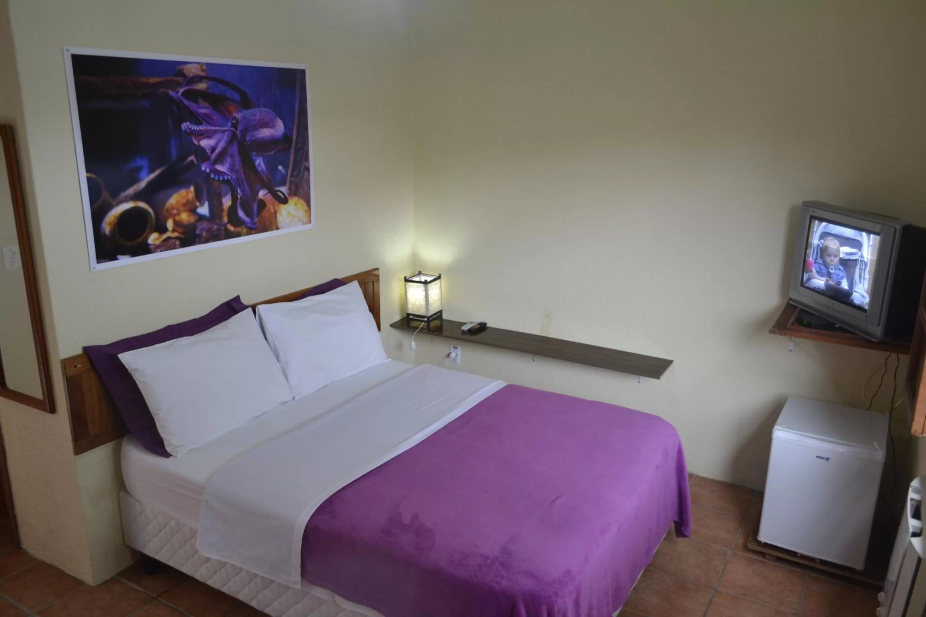 Bed in Pousada Água da Fonte