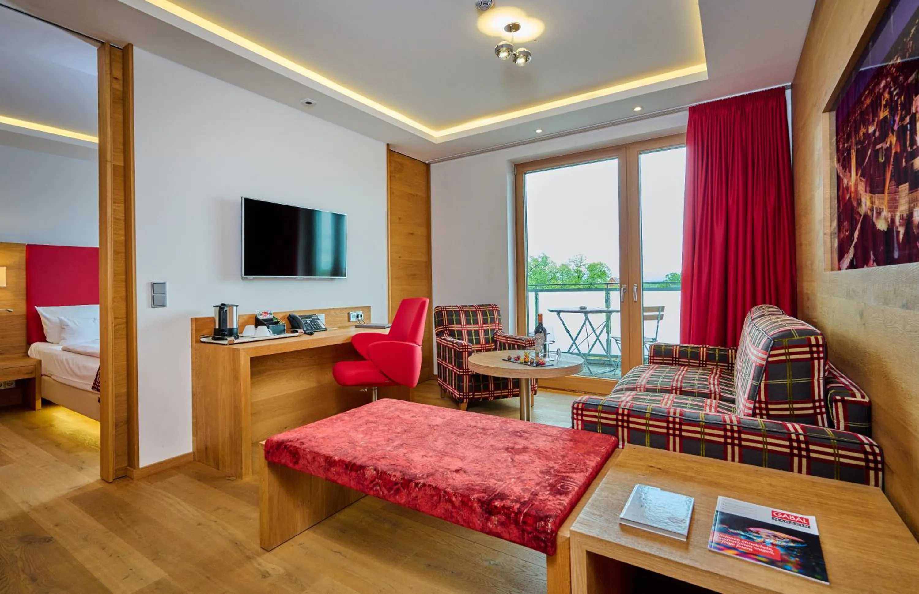 Seating area, Bed in Asam Hotel