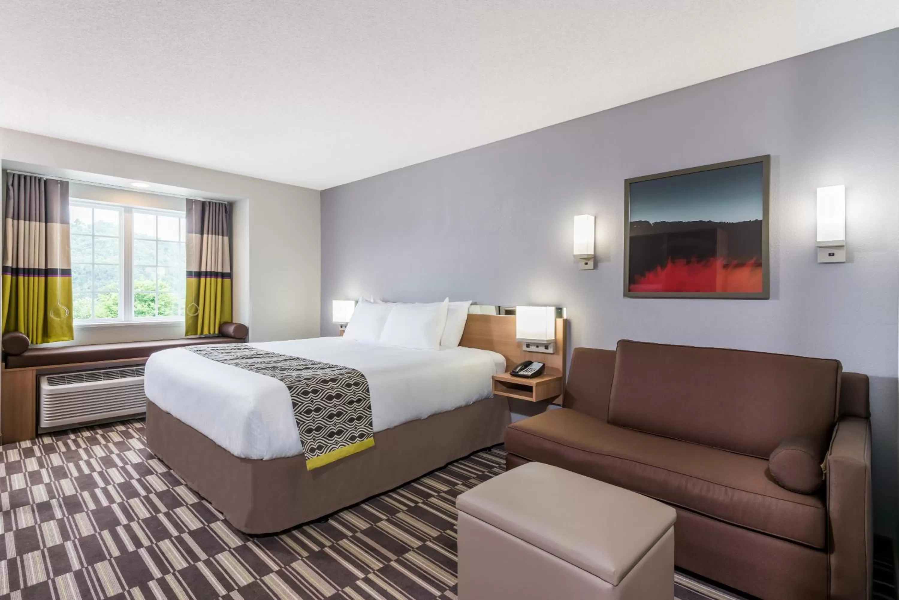 Living room, Bed in Microtel Inn & Suites by Wyndham New Martinsville
