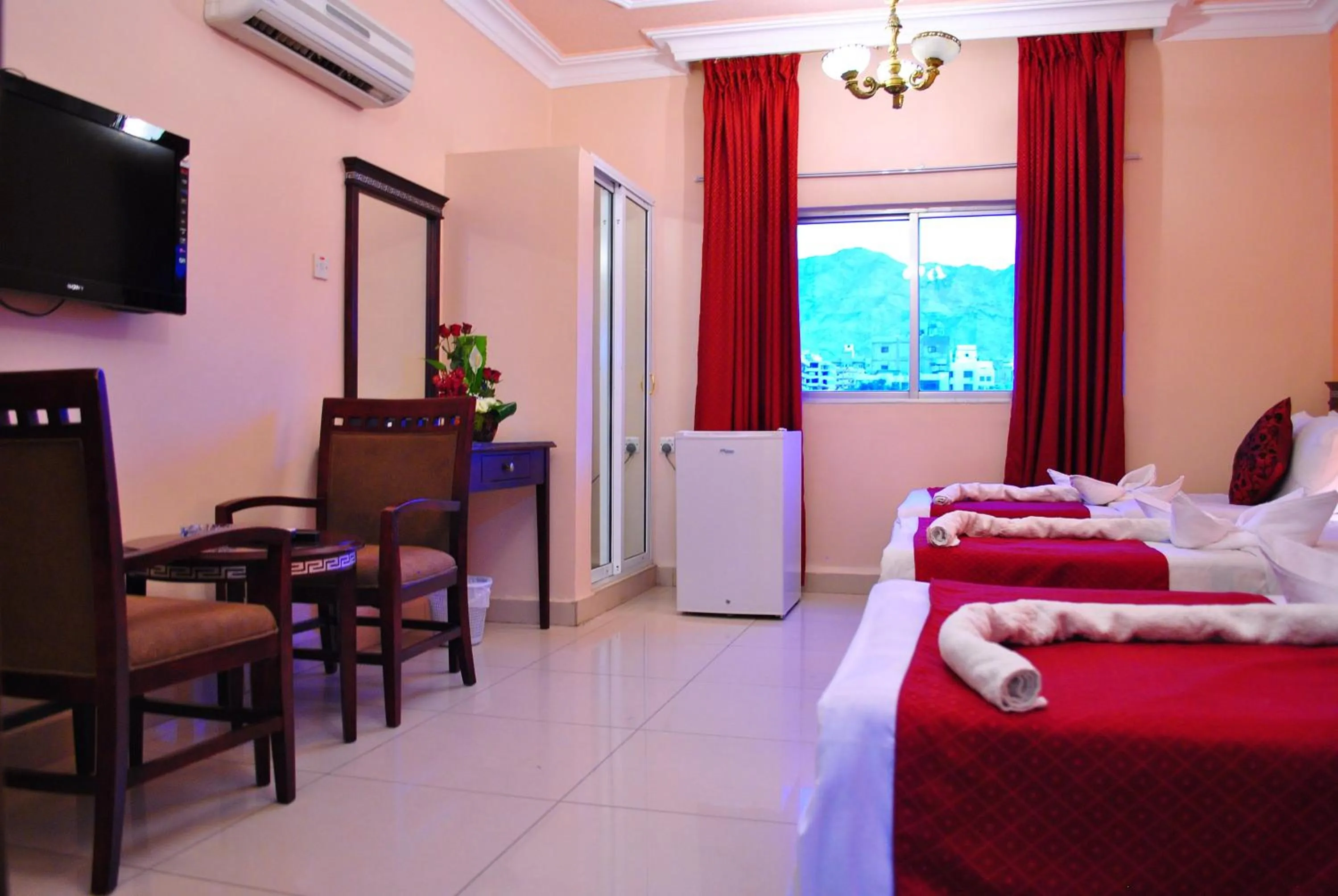 Bed in Al Qidra Hotel & Suites Aqaba