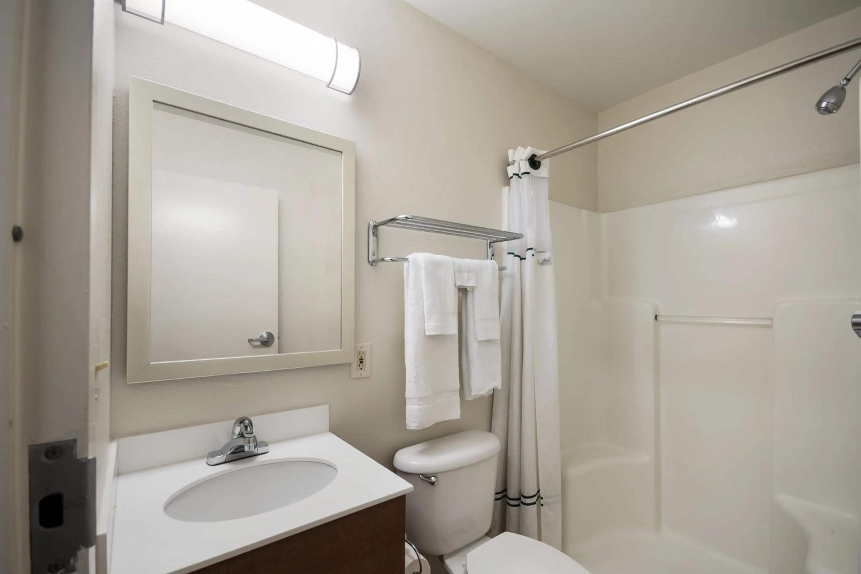 Photo of the whole room in HomeTowne Studios by Red Roof Seattle - Kent/Des Moines