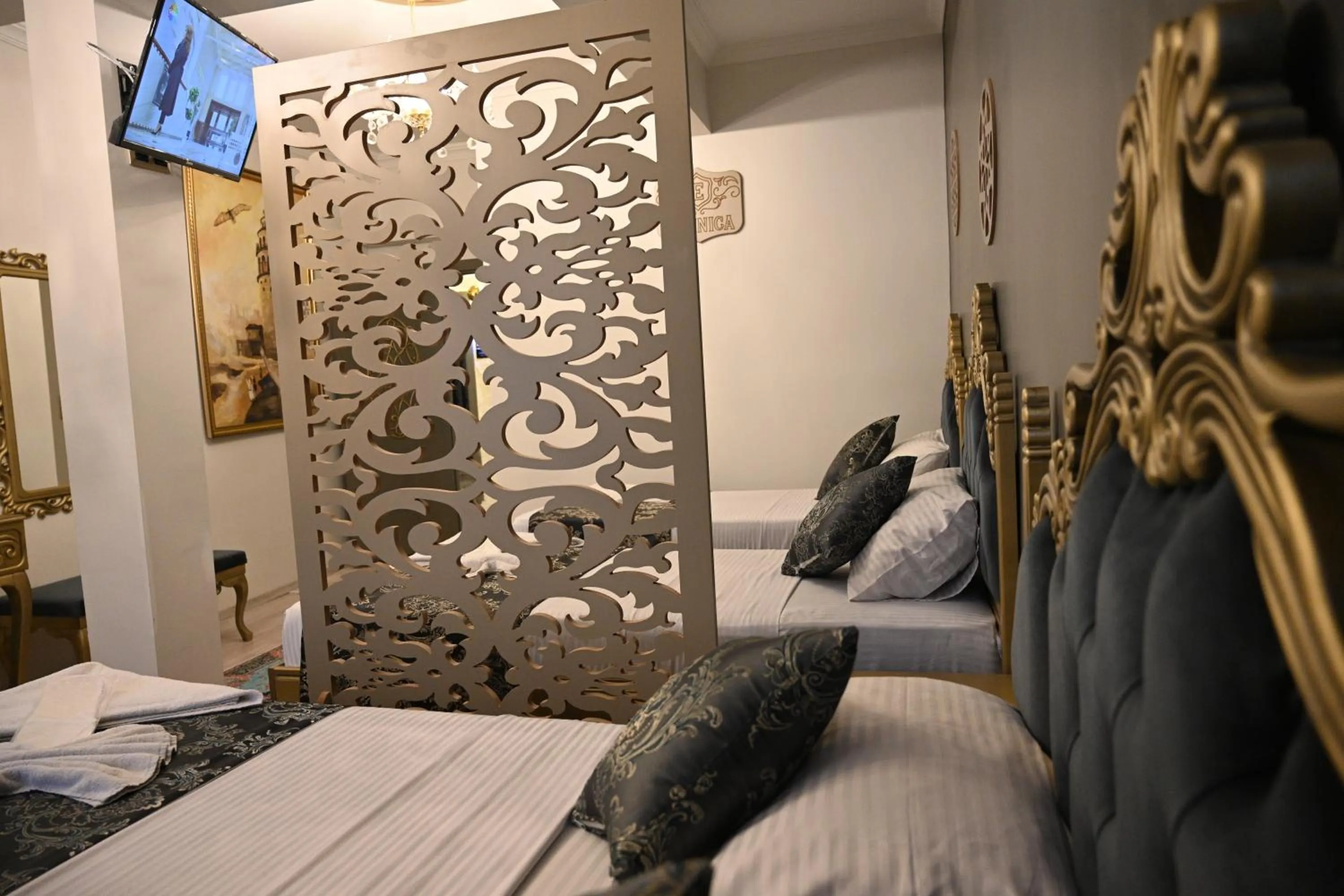 Bed in Ethnica Suites