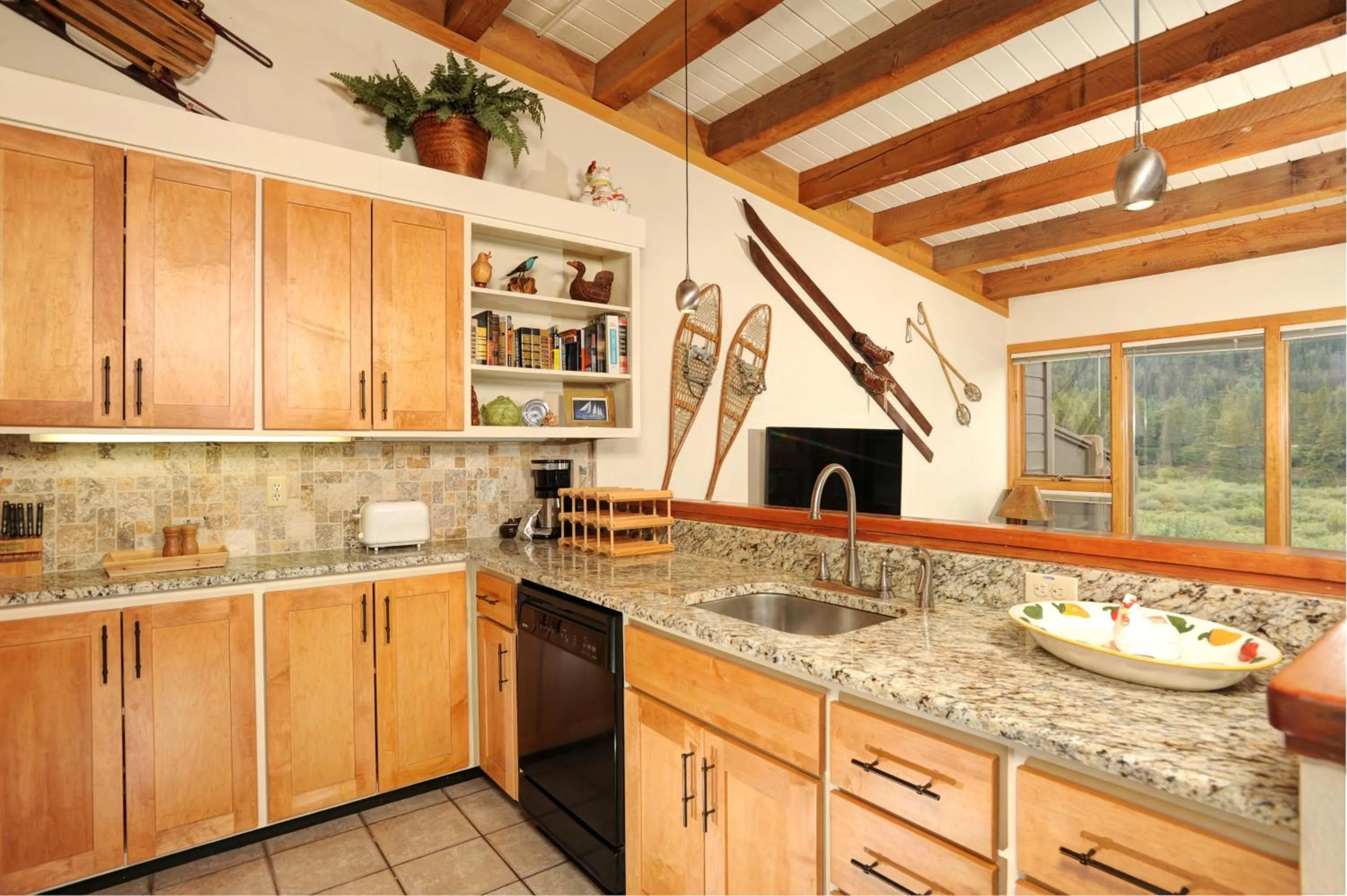 Kitchen or kitchenette in Evergreen Condominiums by Vail Resorts