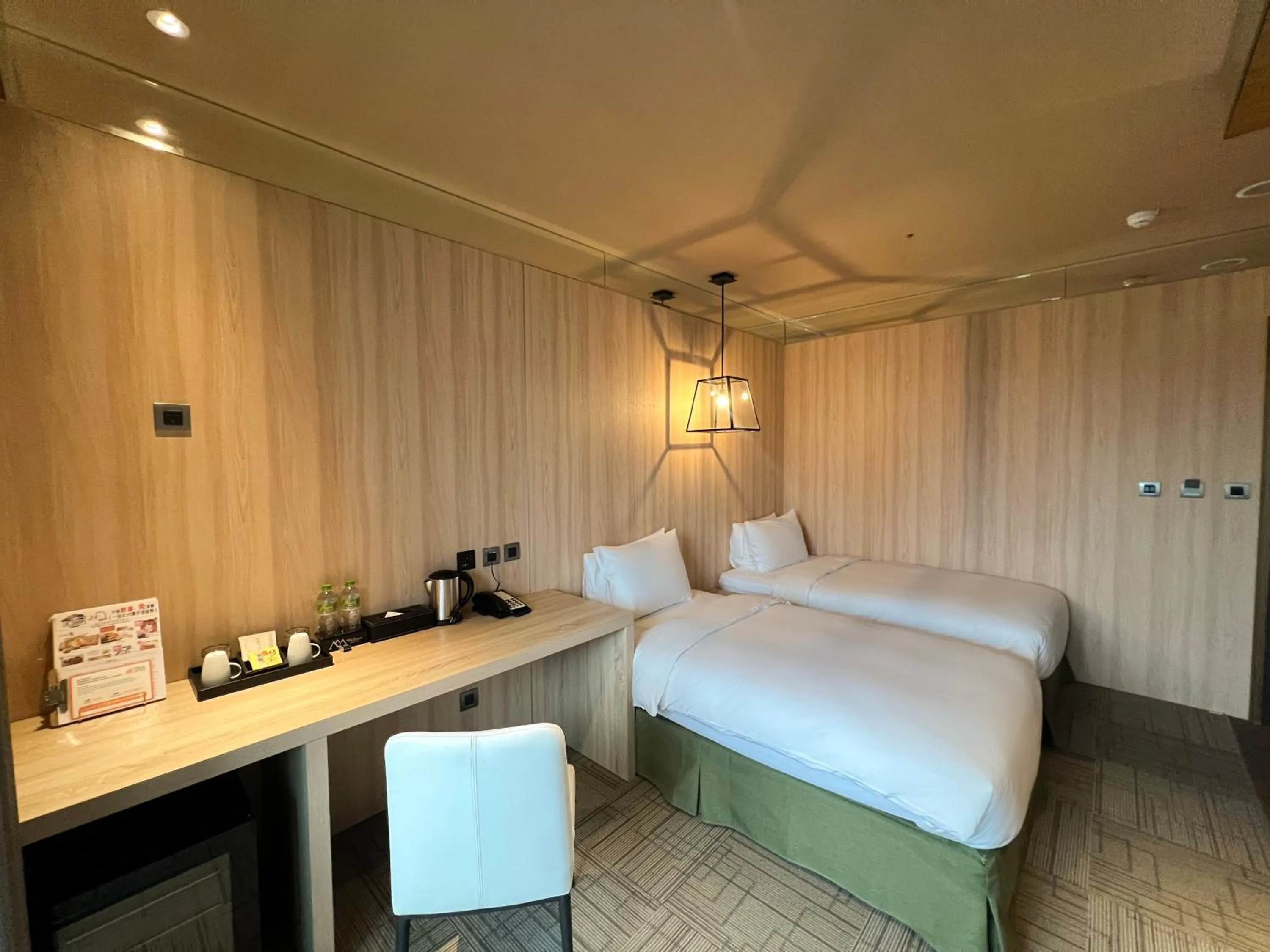 Bedroom in Wallsun Hotel