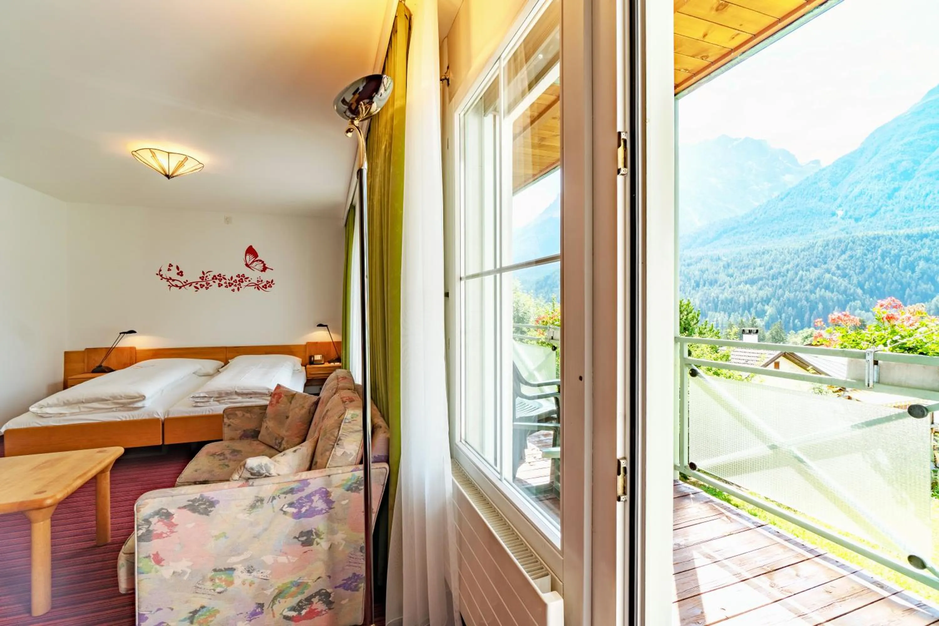 Balcony/Terrace, Bed in Typically Swiss Hotel Altana