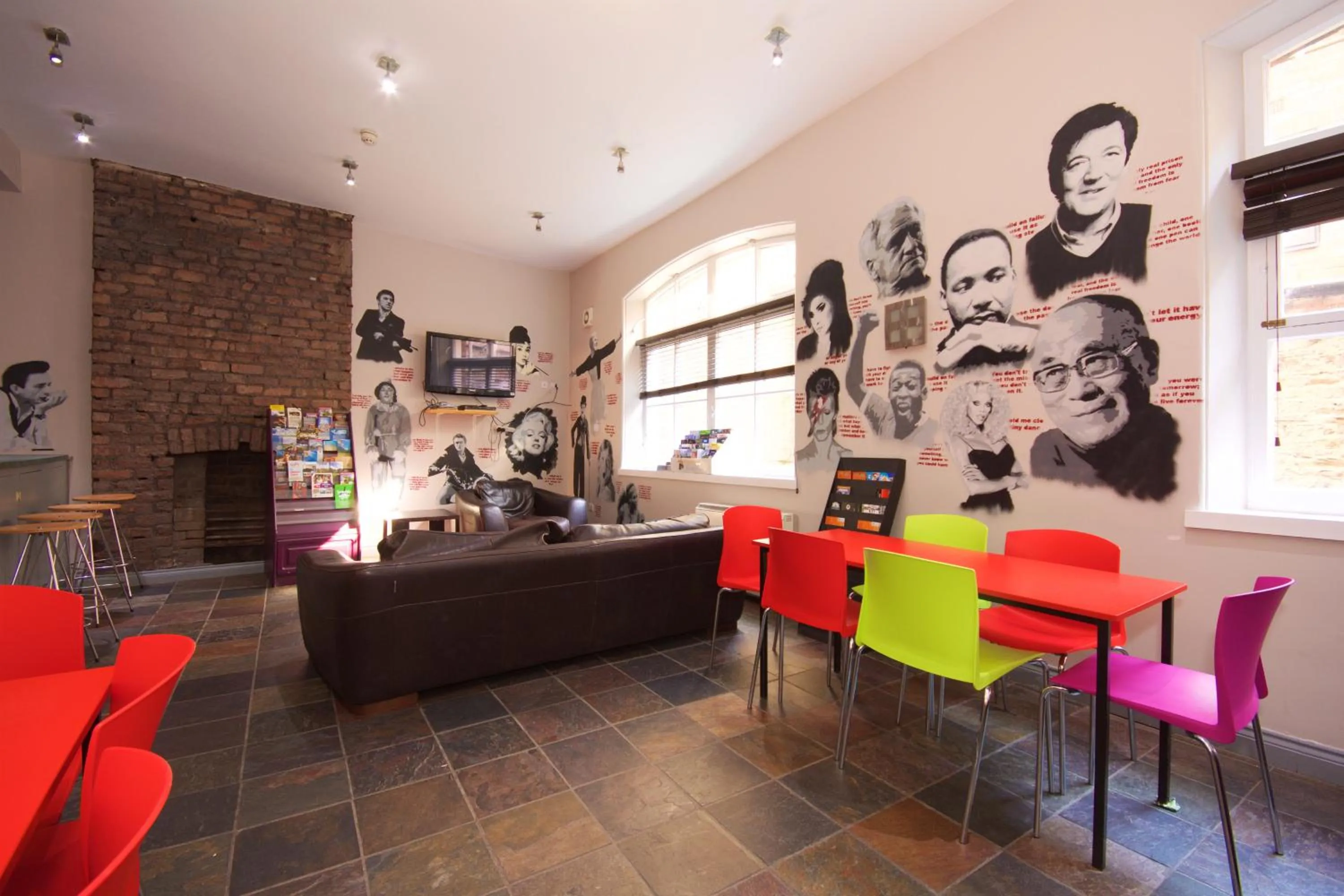 Communal lounge/ TV room in Albatross Hostel