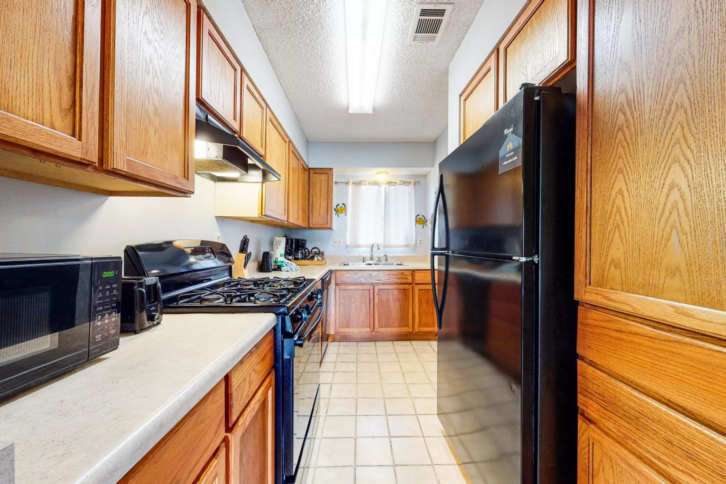 Kitchen/Kitchenette in Beachwalk Condos #14F
