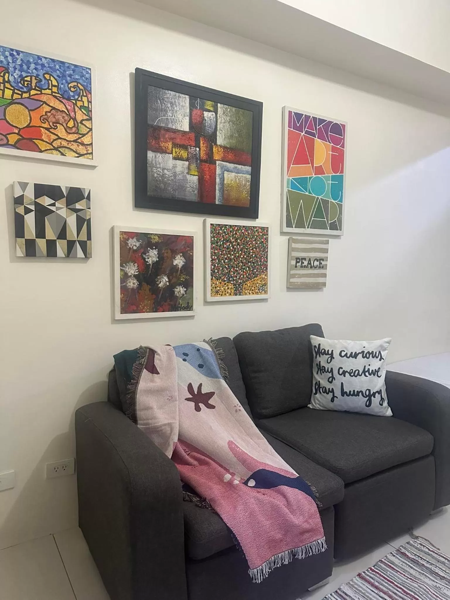 Living room, Seating Area in Green Residences Staycation by PBYY