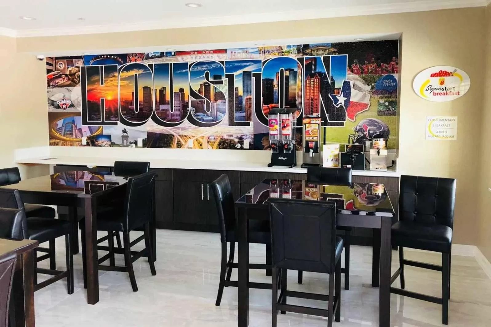 Communal lounge/ TV room in Super 8 by Wyndham Houston Northwest Cypress