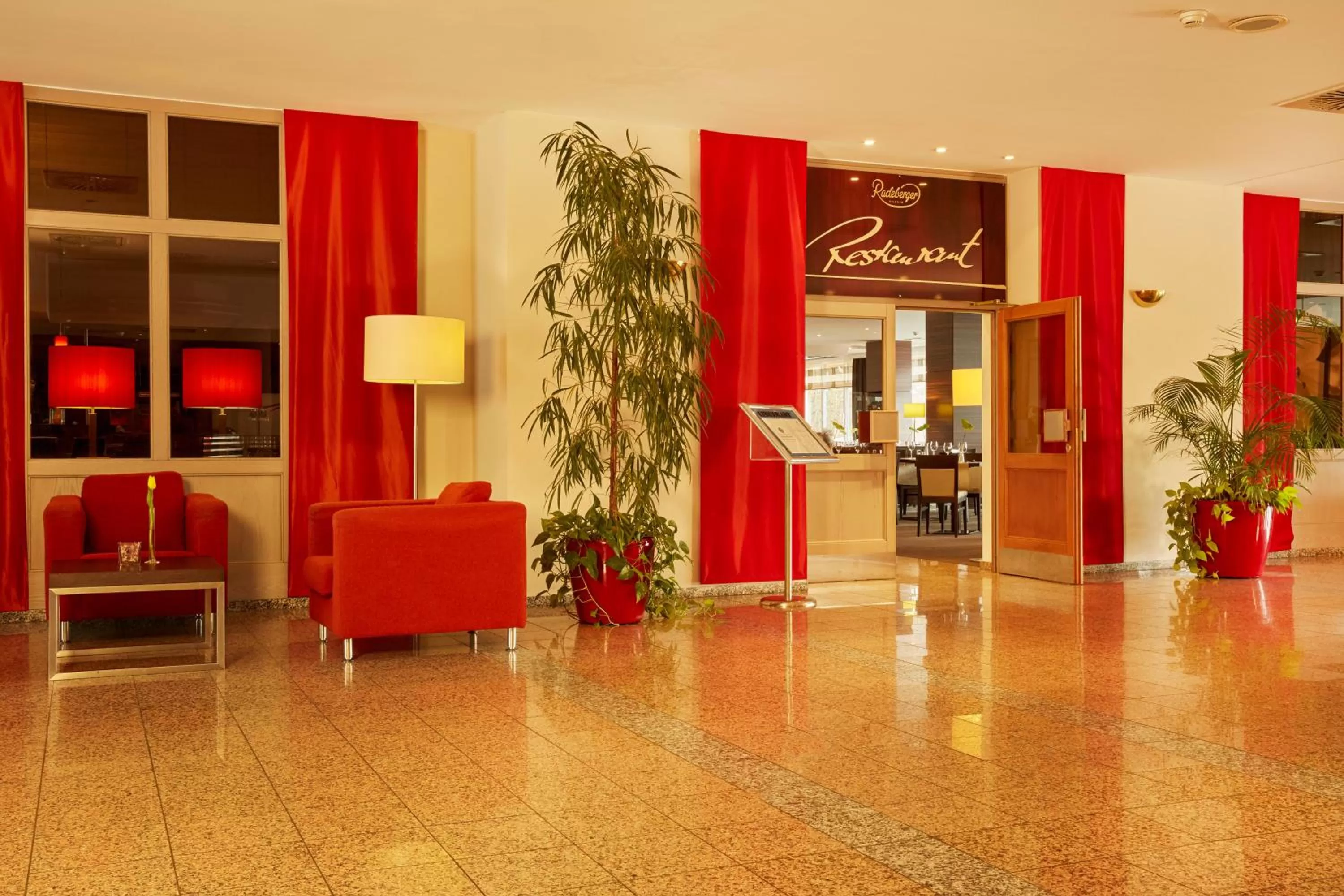 Lobby or reception in H+ Hotel Leipzig-Halle