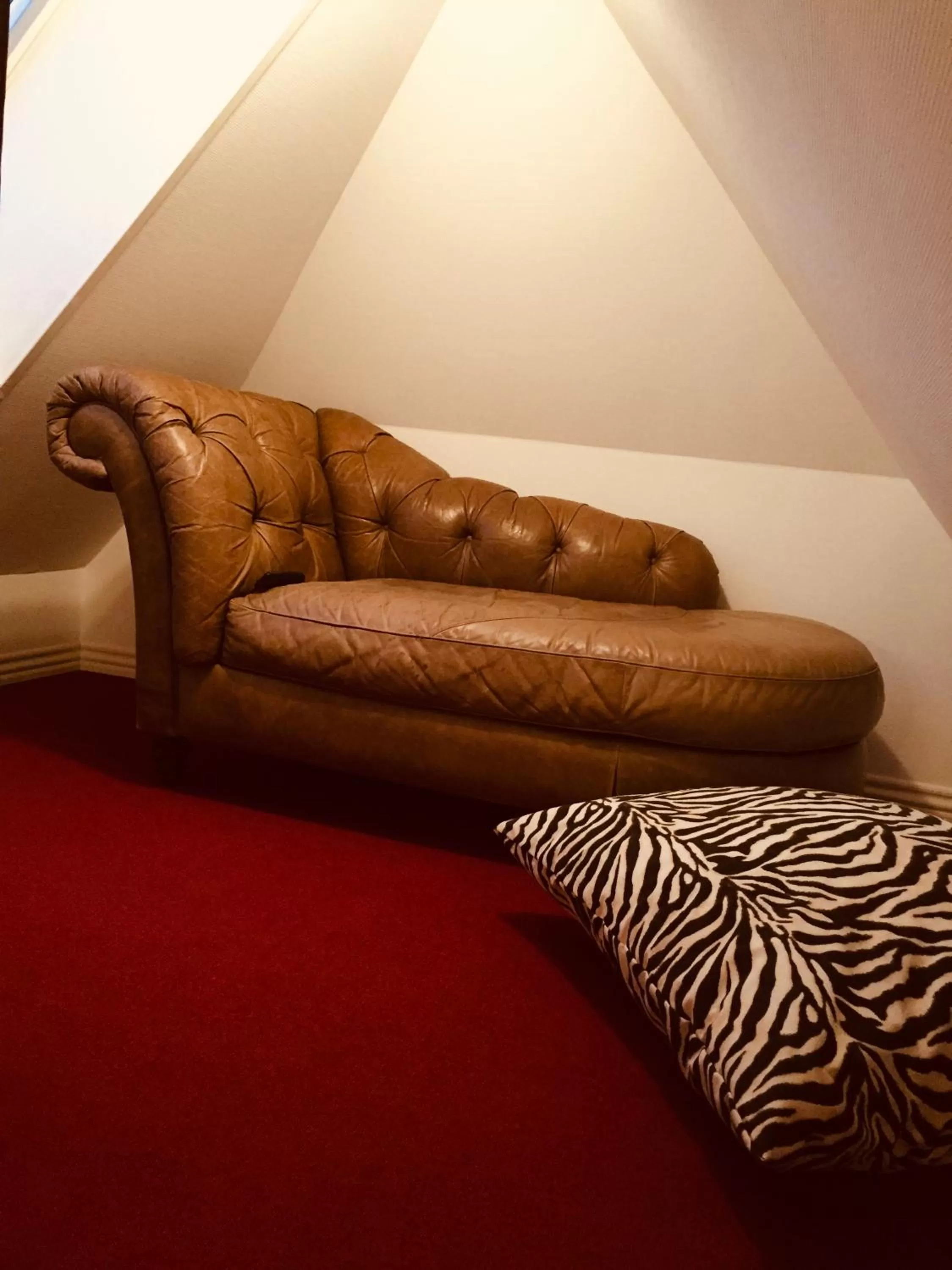 Seating area, Bed in Boutique Hotel Postgården