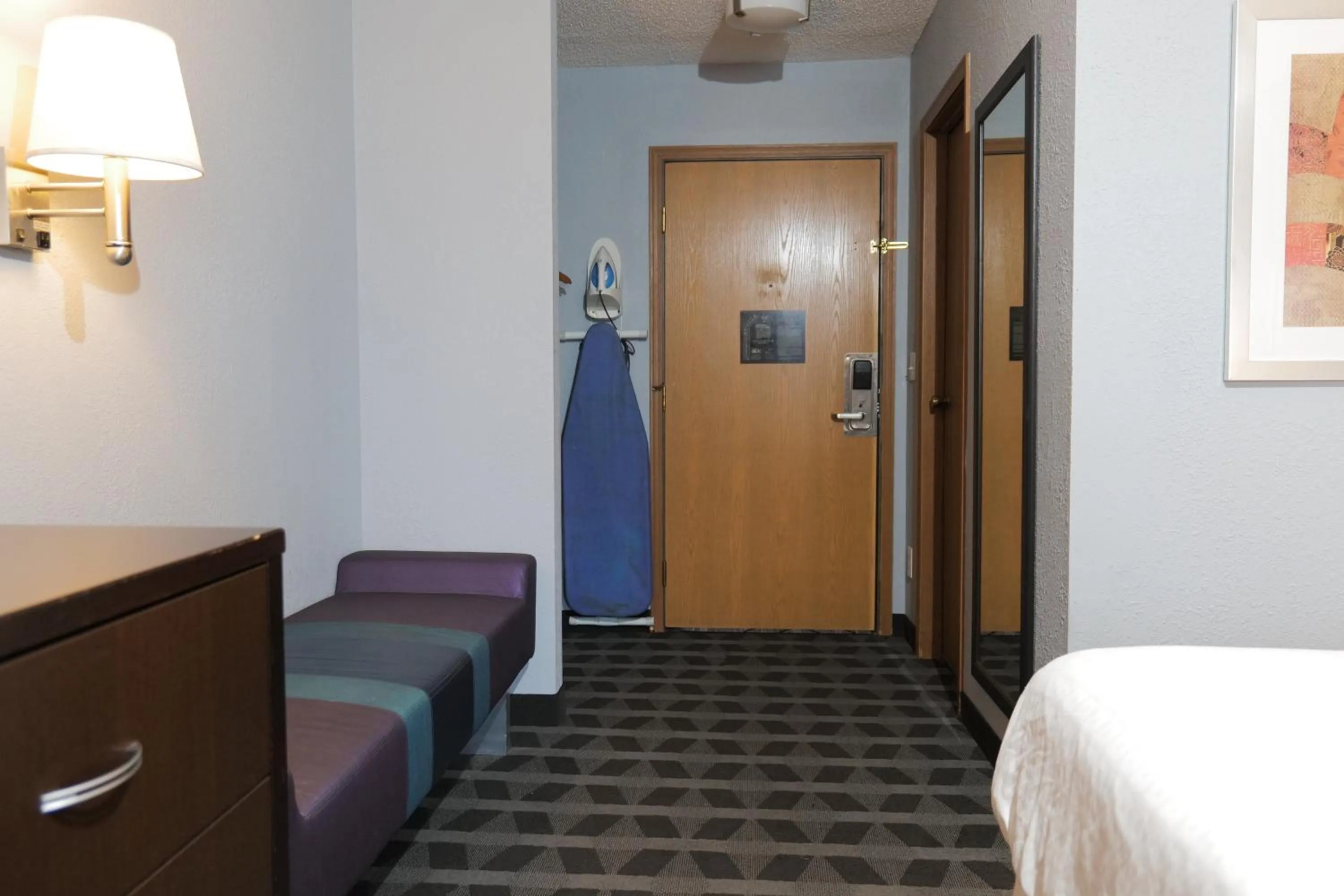 furniture, Bed in Baymont by Wyndham Flint Airport North