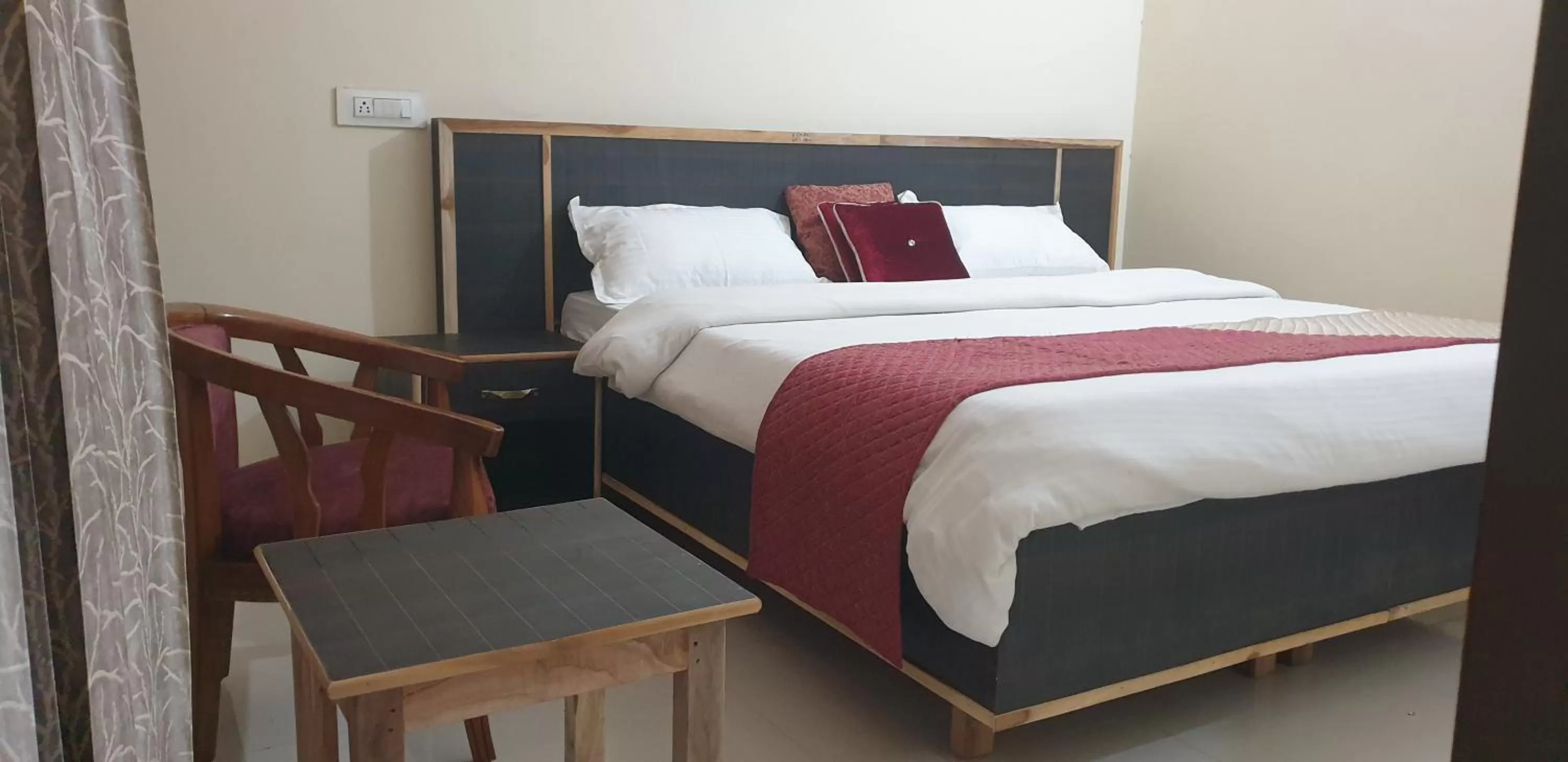 Bed in Maple Leaf Hotel