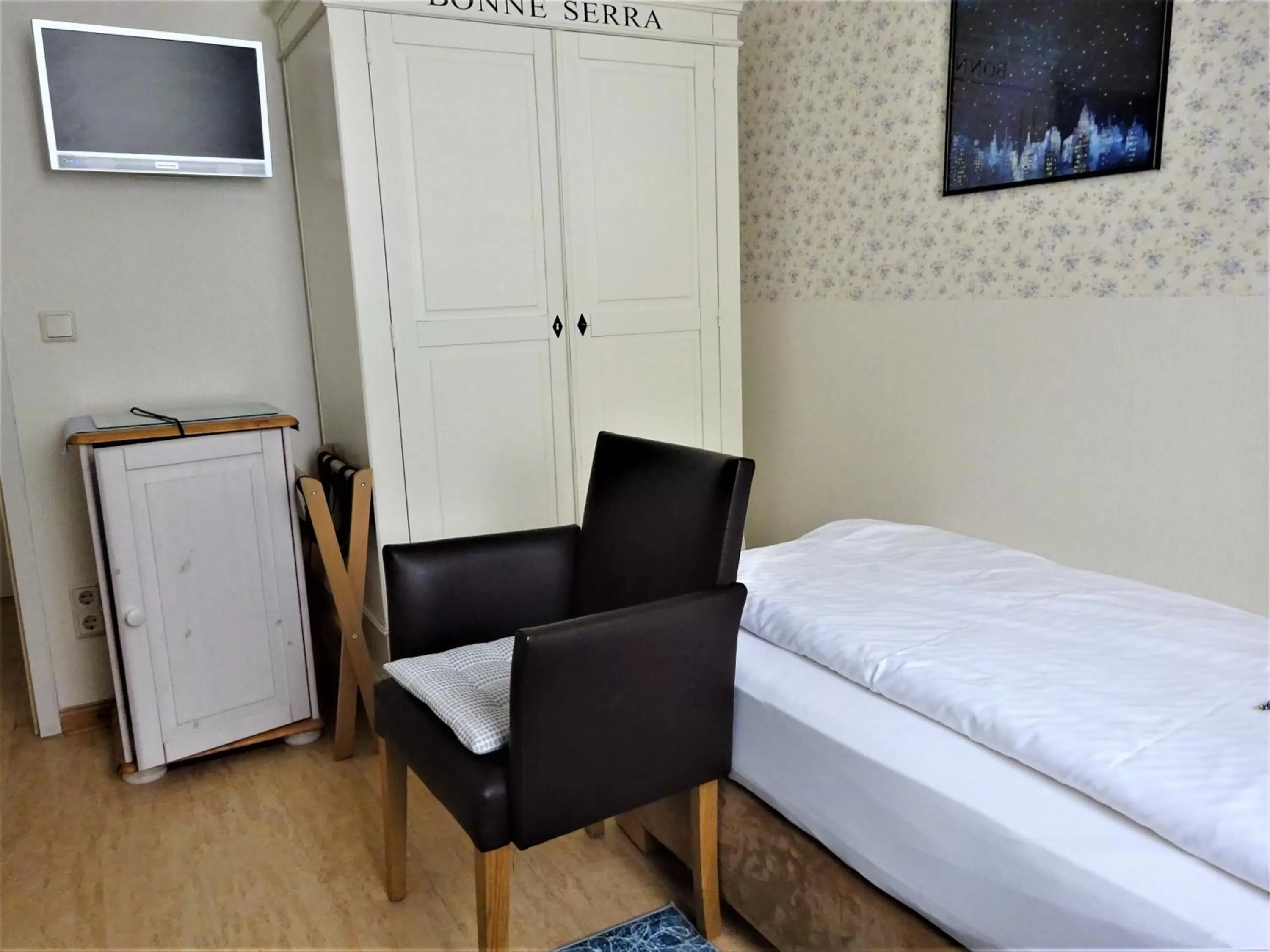 Bed, TV/Entertainment Center in Pension Zur Fährbrücke