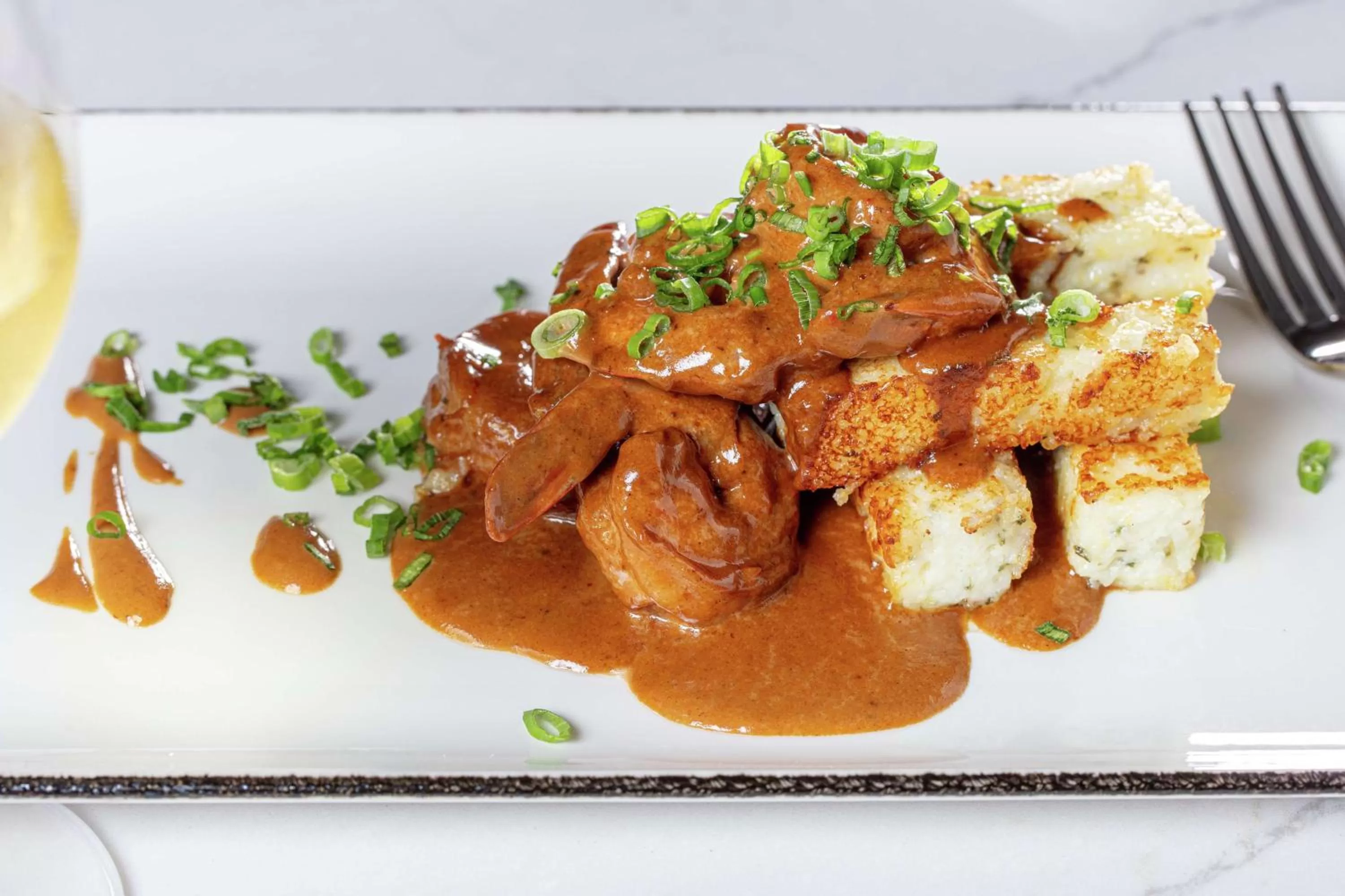Dining area in The Higgins Hotel New Orleans, Curio Collection by Hilton
