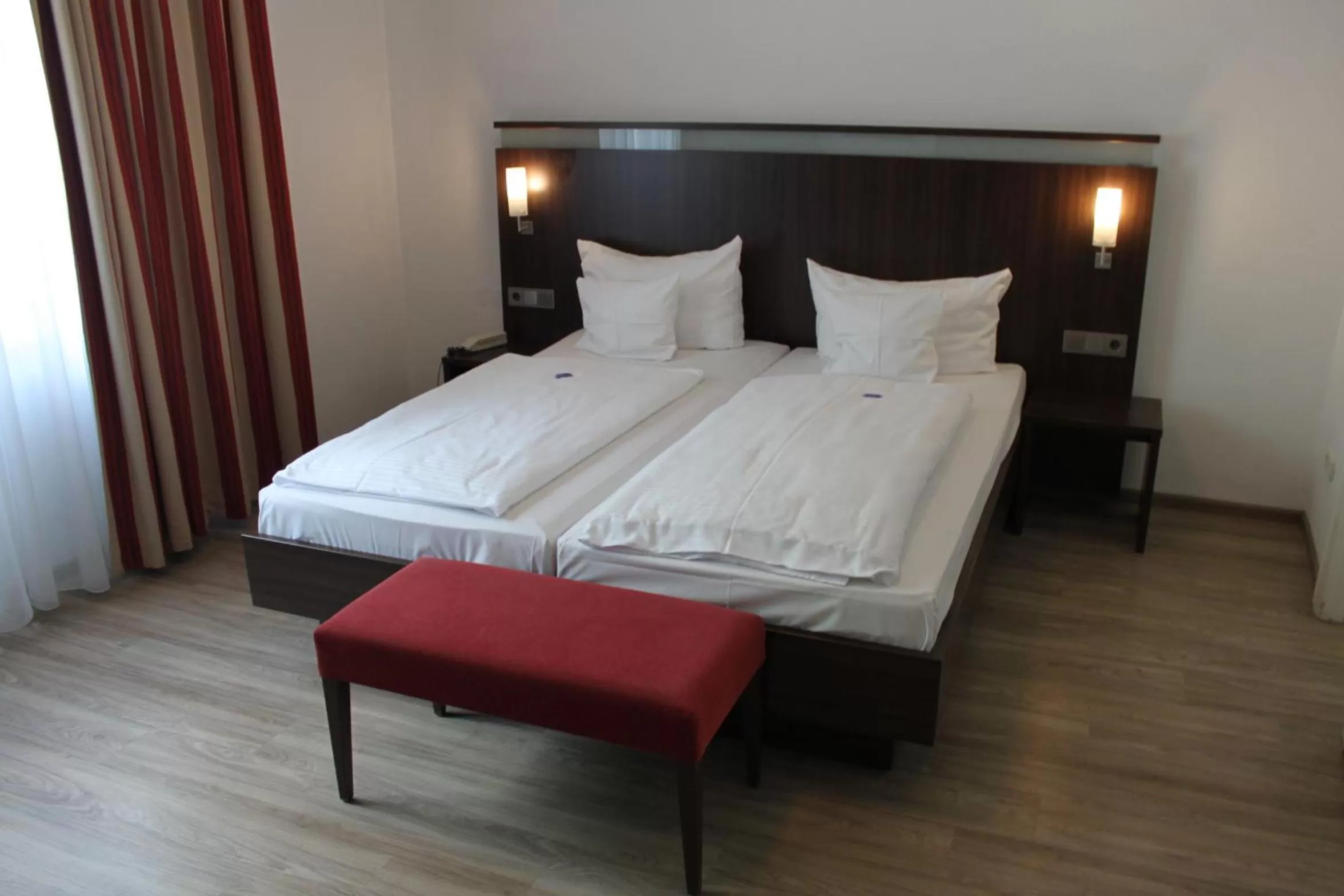 Photo of the whole room, Bed in Hotel Am Römerwall