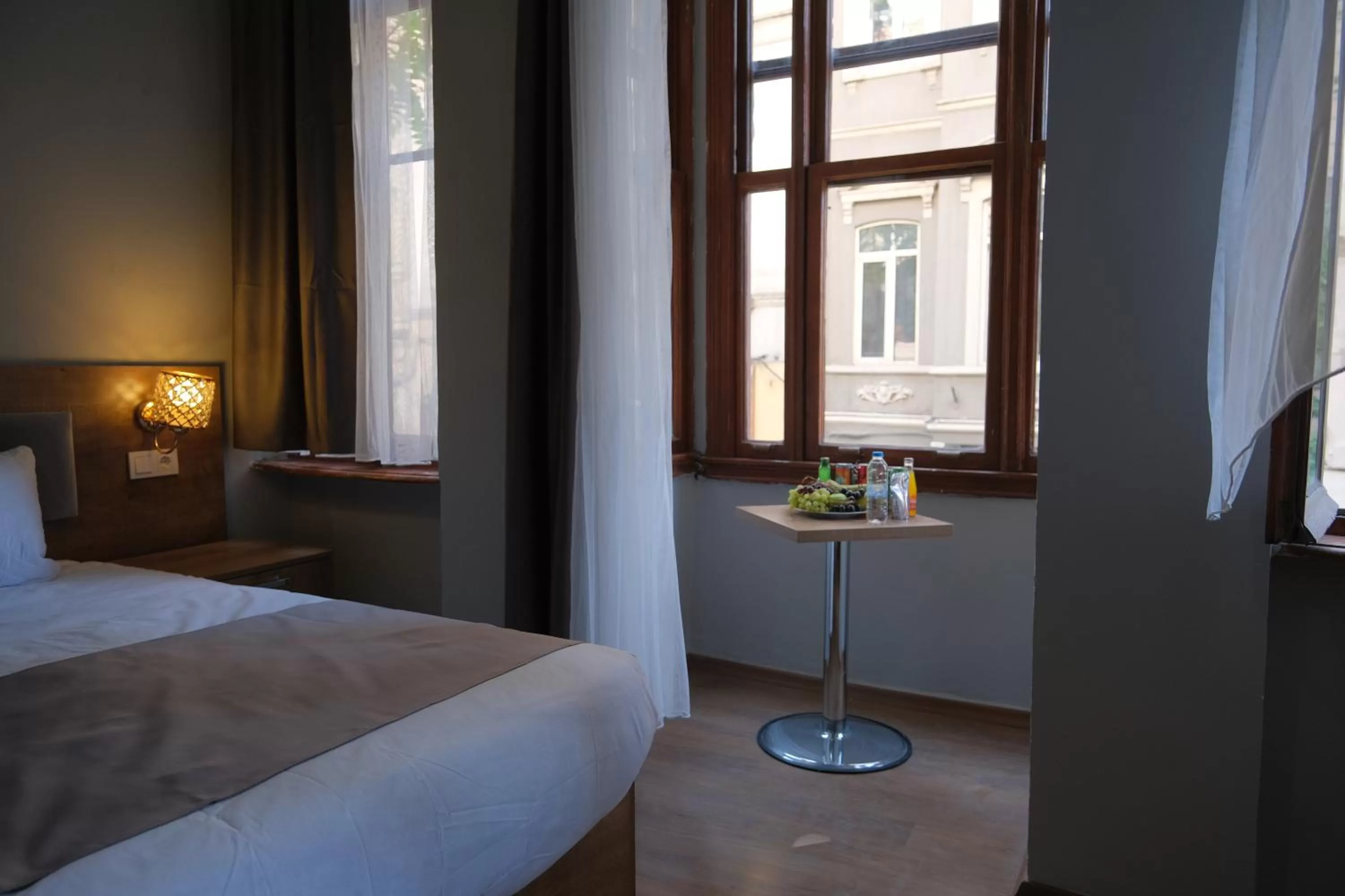 Bed in Adamantides Hotel