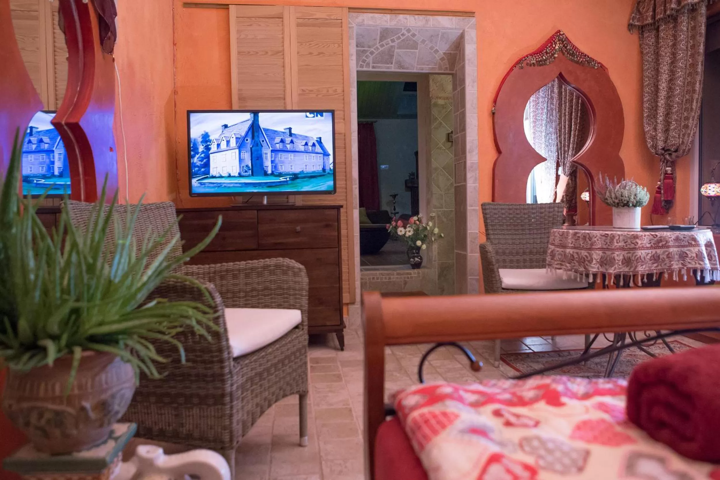 Bed, Seating Area in Green Park Villa