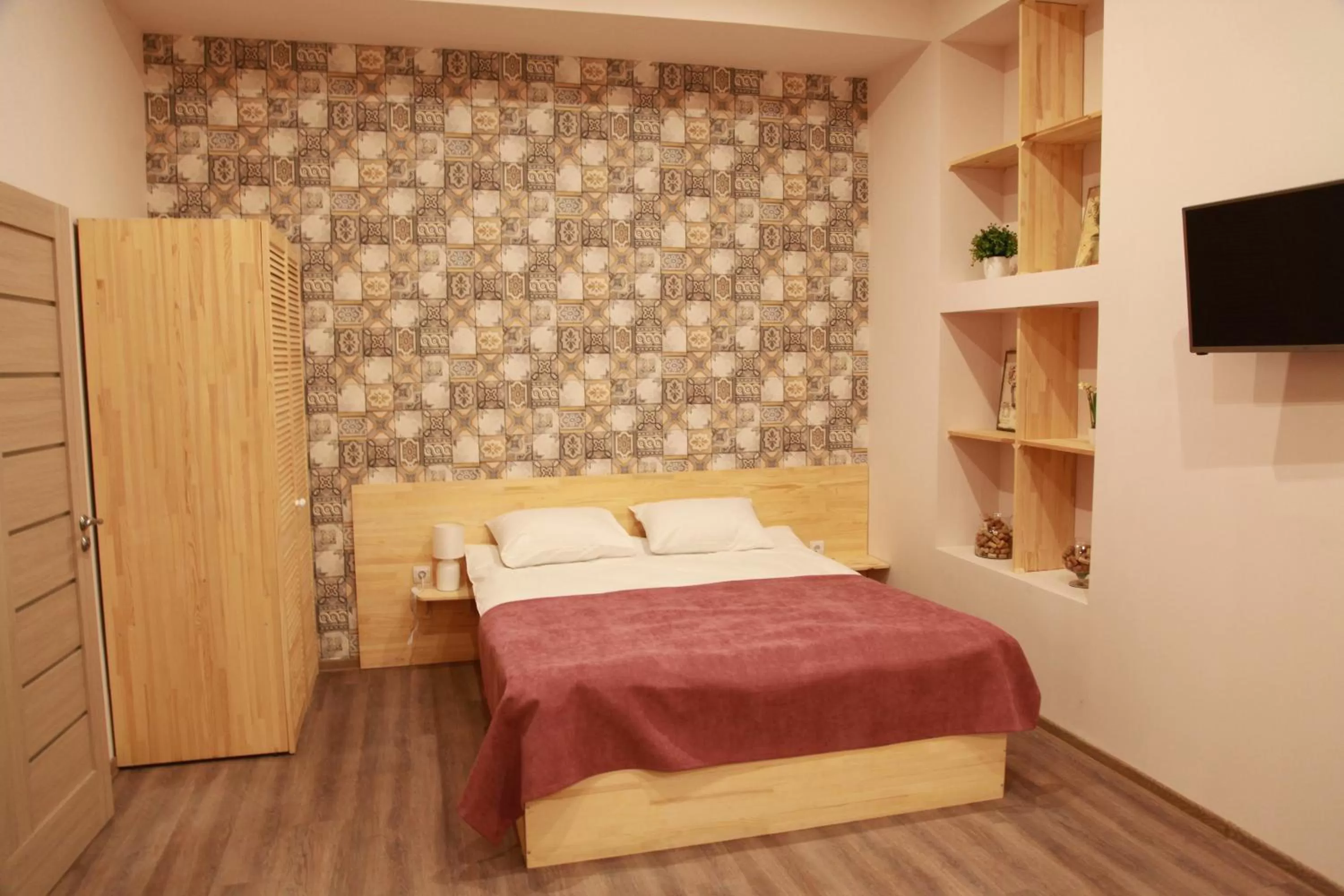 Bed in WINE & ROSE BOUTIQUE HOTEL