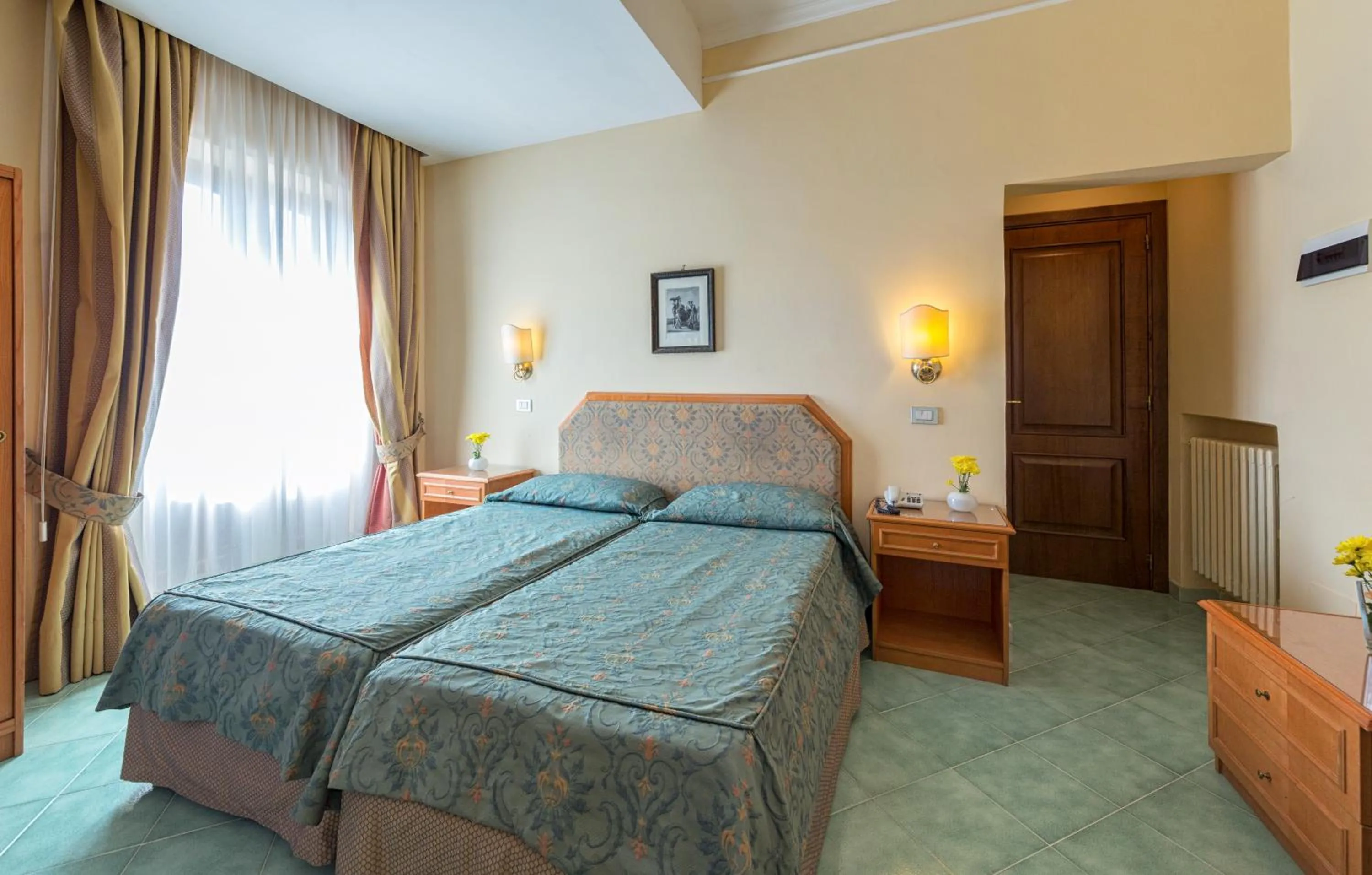 Bed in Hotel Iaccarino